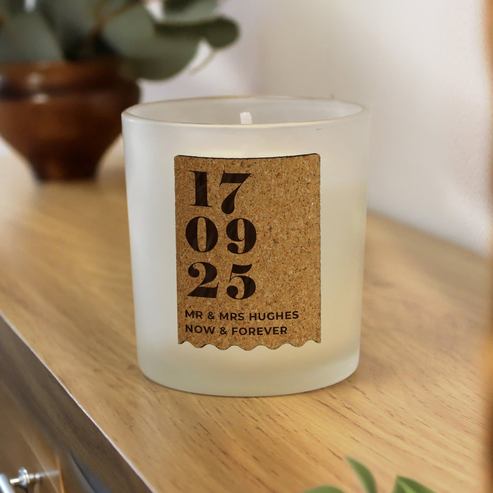 Vanilla jar candle with a cork label for an anniversary date and message