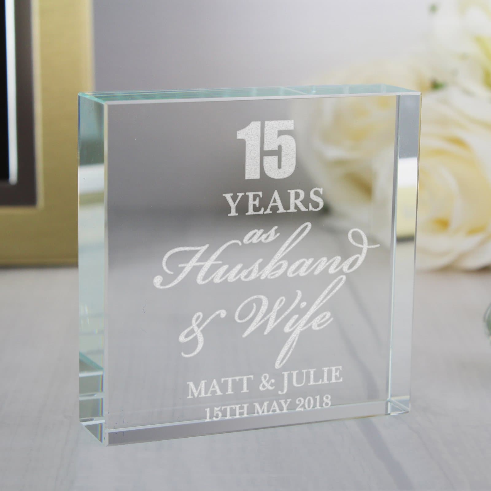 Personalised anniversary crystal token with years and a message
