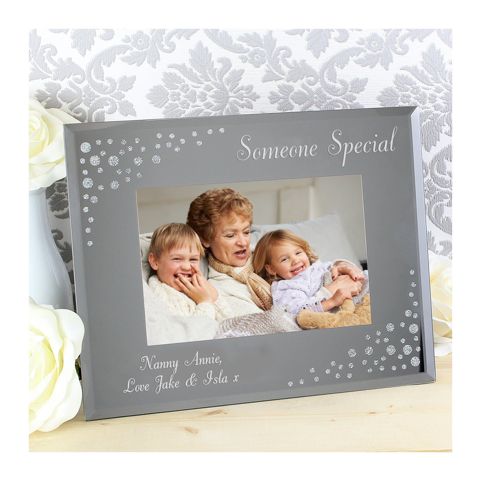 Landscape diamante glass photo frame with a mirrored effect and a stand