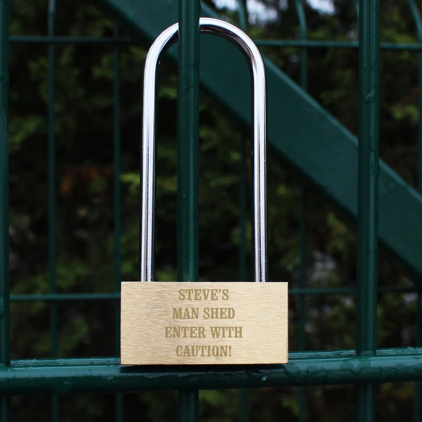 Padlock personalised with four lines of block capital text