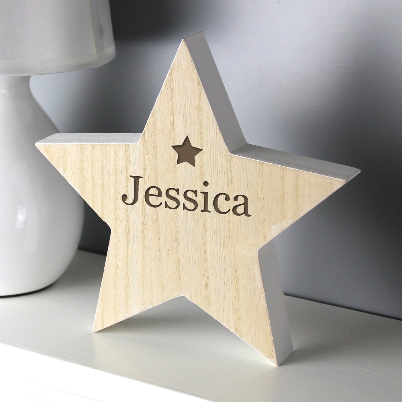 Rustic wooden star decoration with a personalised name