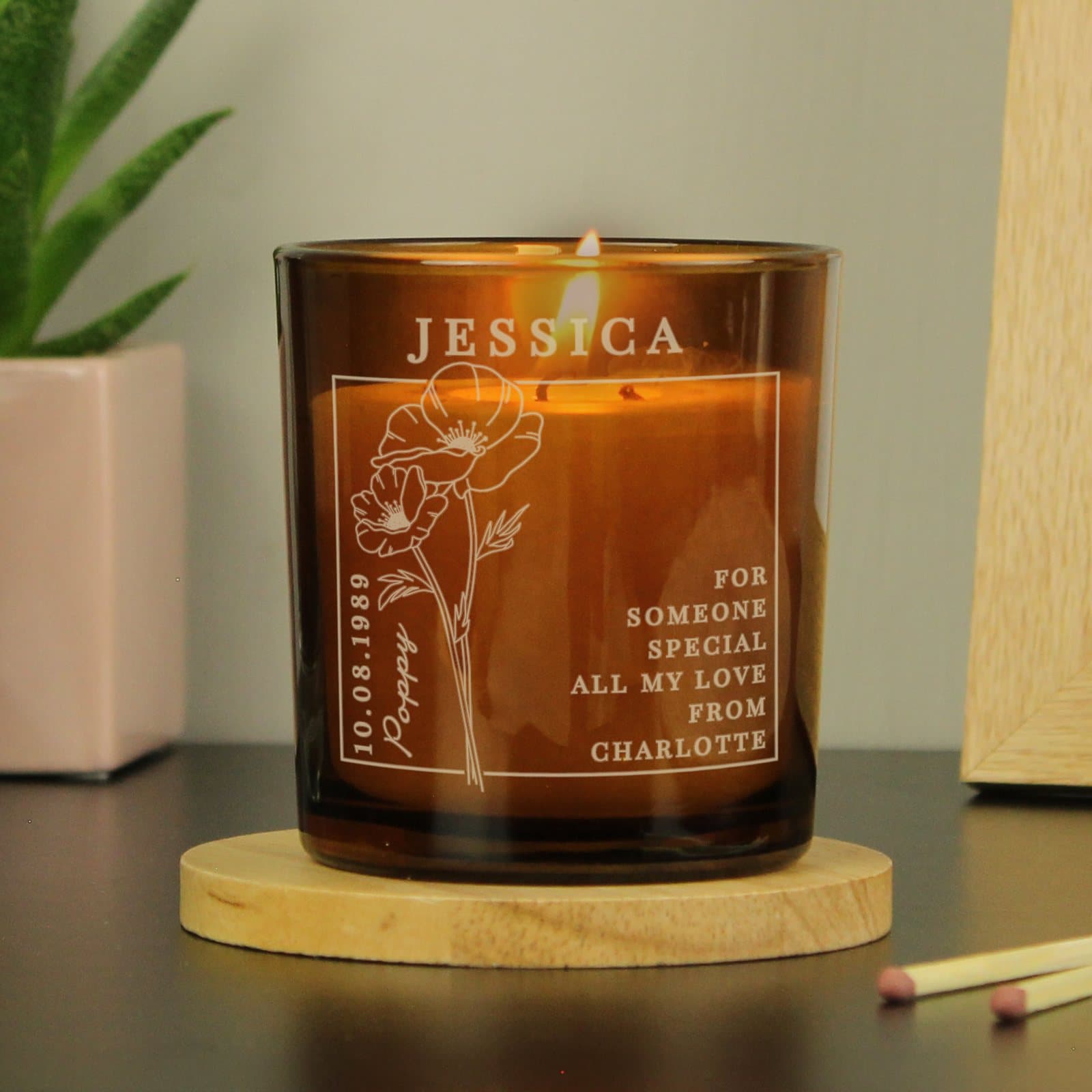Amber glass candle jar with August birth flower design, name and date