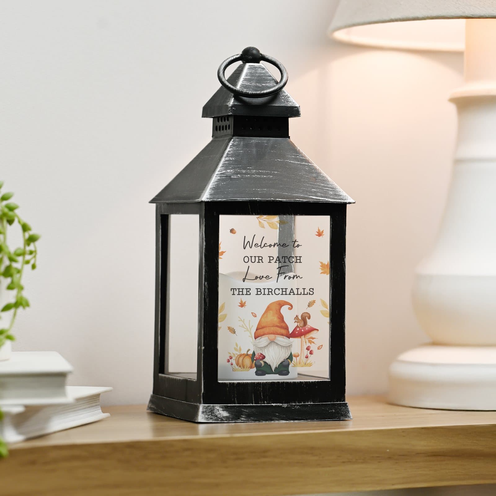Matte black gonk LED lantern with a hanging hoop