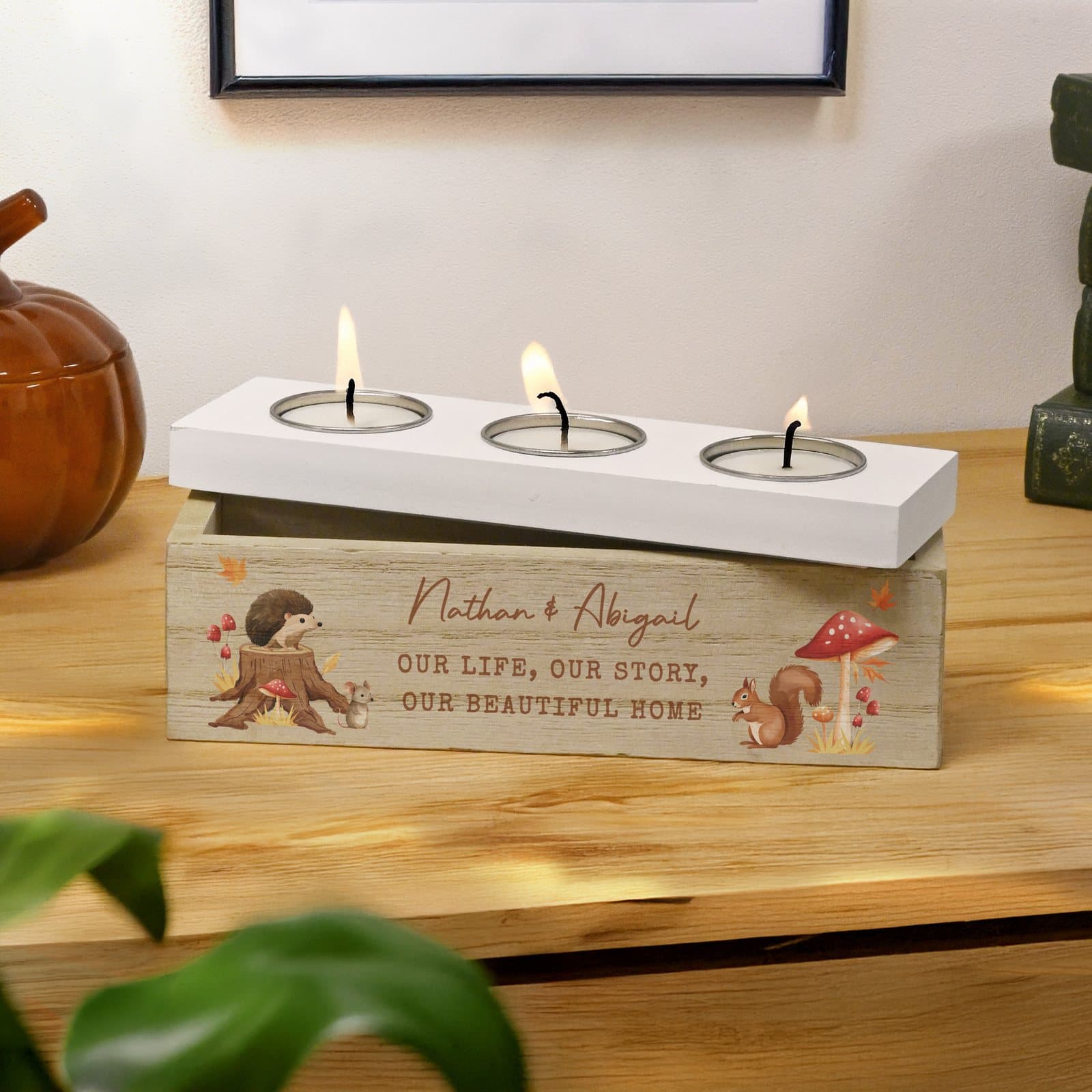 Wooden autumn tea light box with autumn animals and personalised text on the front