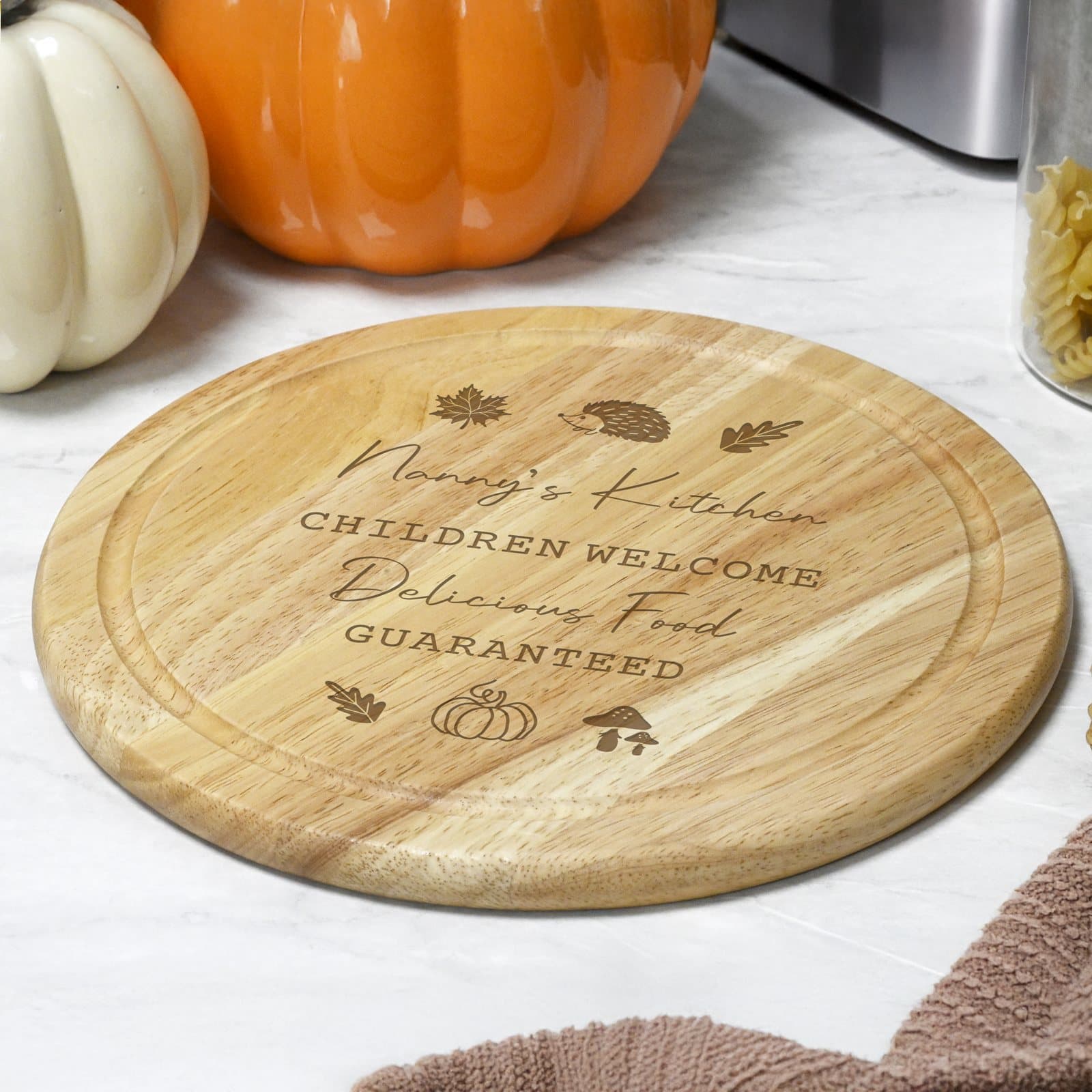 Personalised autumn wooden chopping board in natural wood