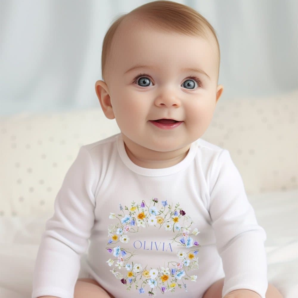 Personalised baby girl spring flowers baby grow with a flowers design and name