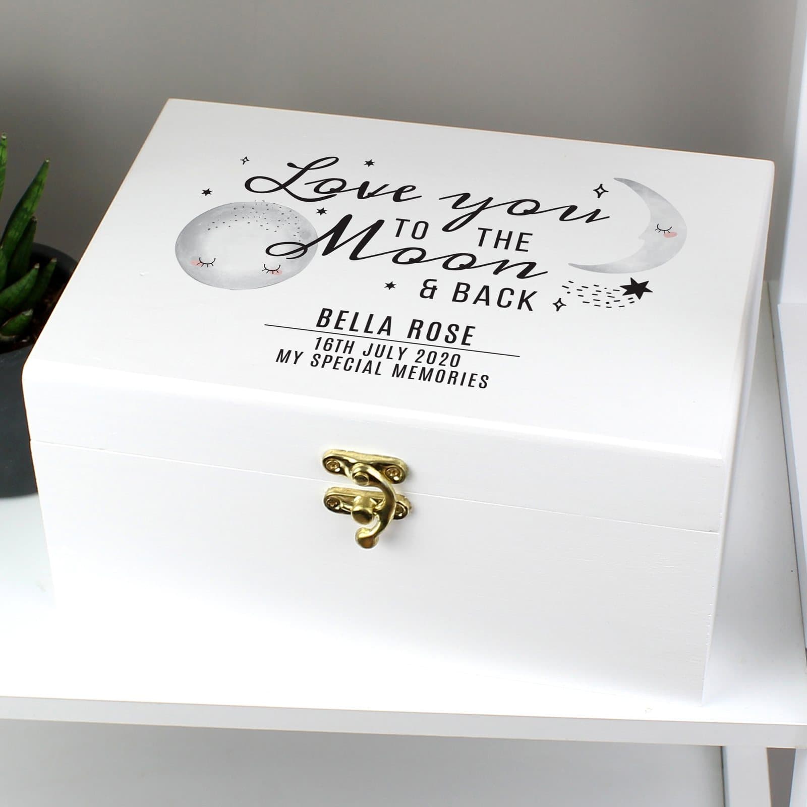 White wooden keepsake box with metal clasp and moon and back words
