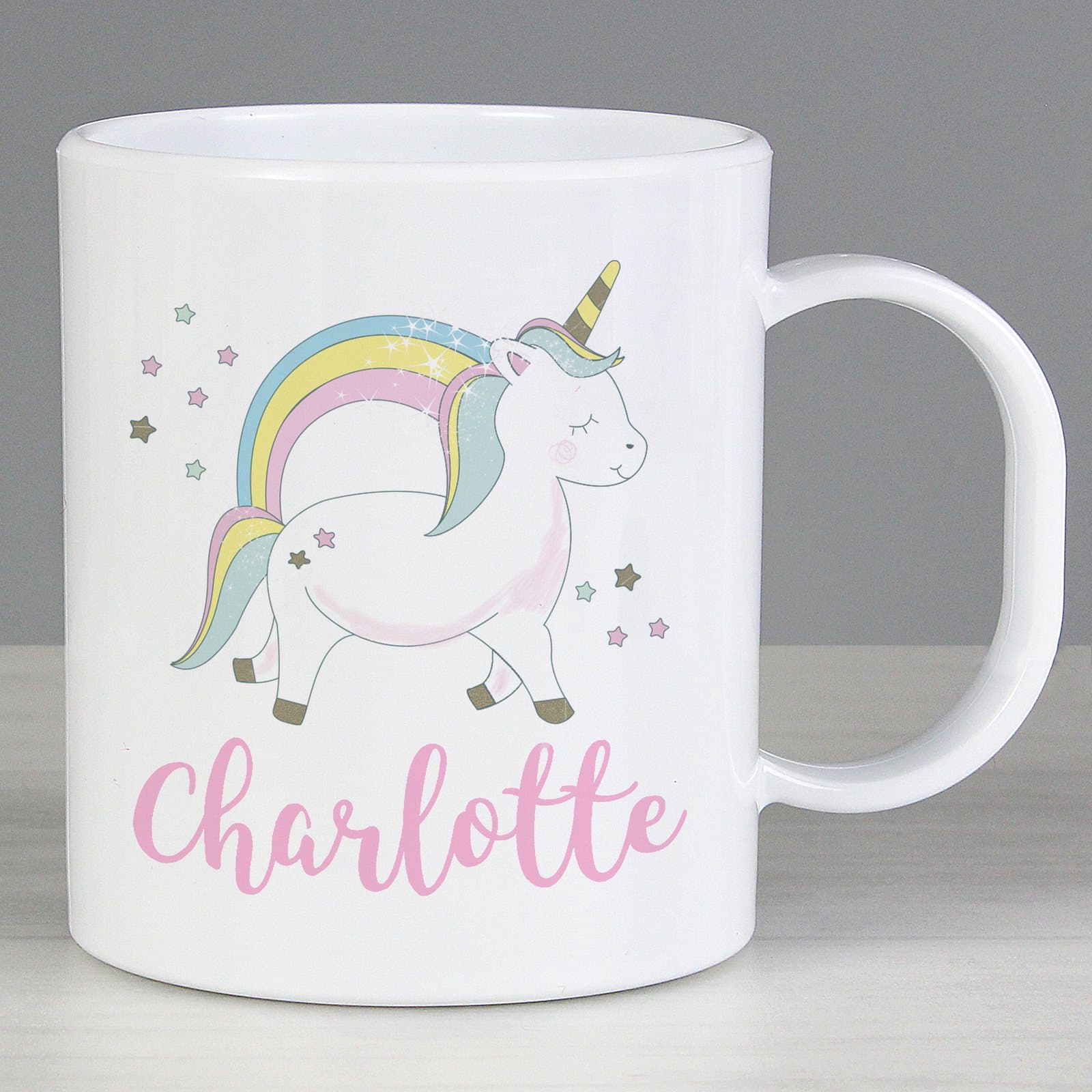 Personalised Baby Unicorn plastic mug with a name on the front
