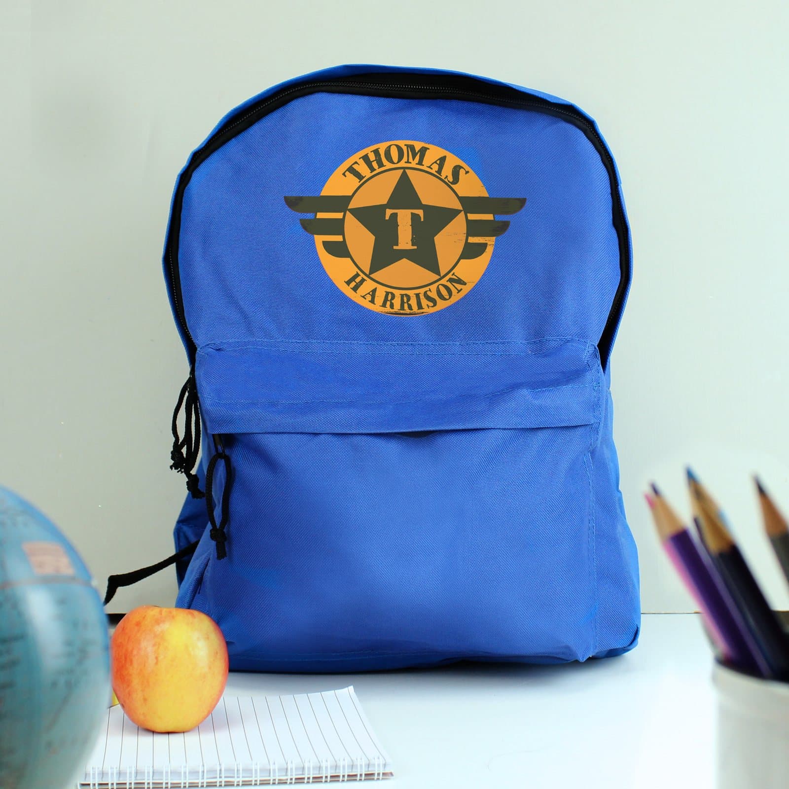 Personalised badge blue backpack with name and message