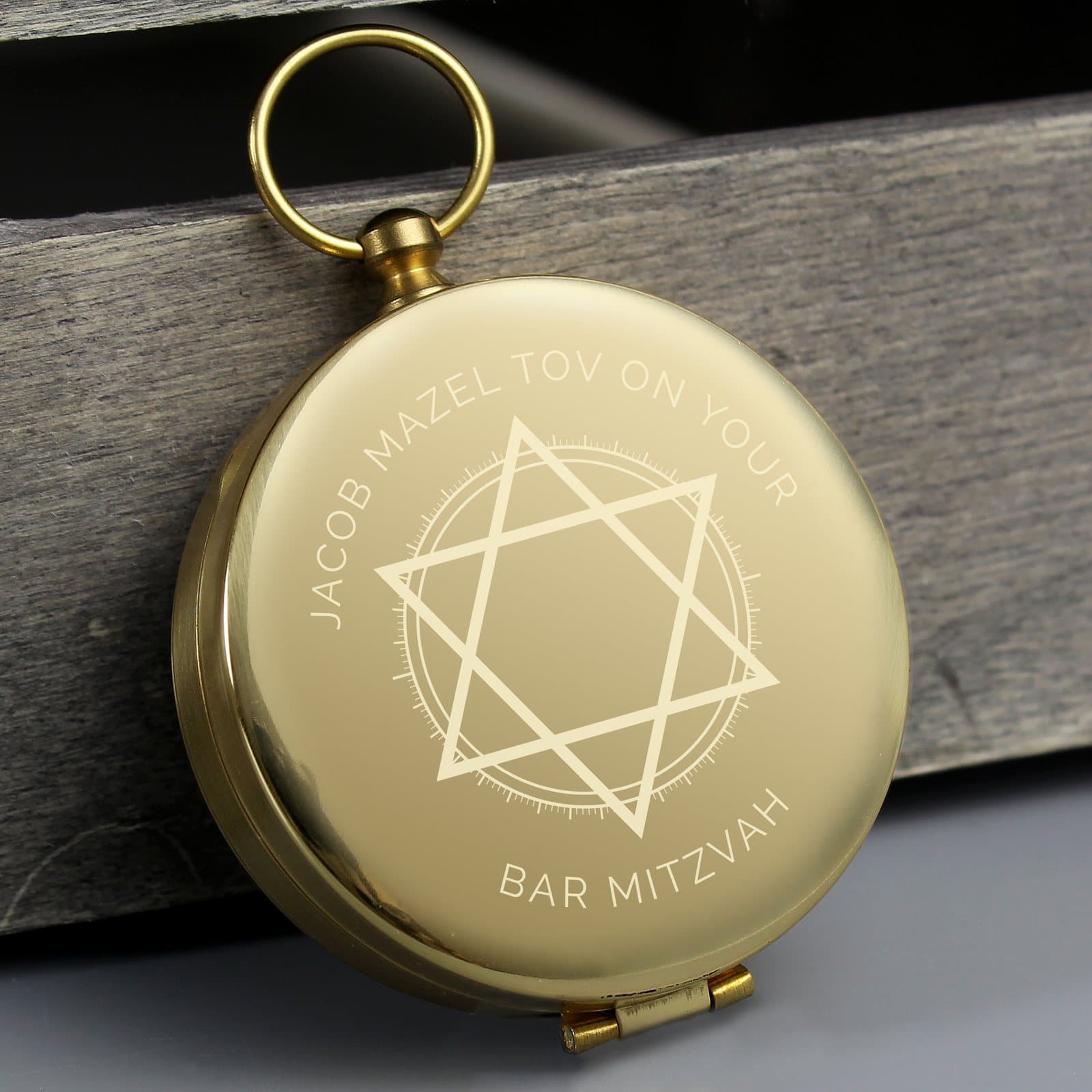 Small keepsake compass engraved with two lines of text