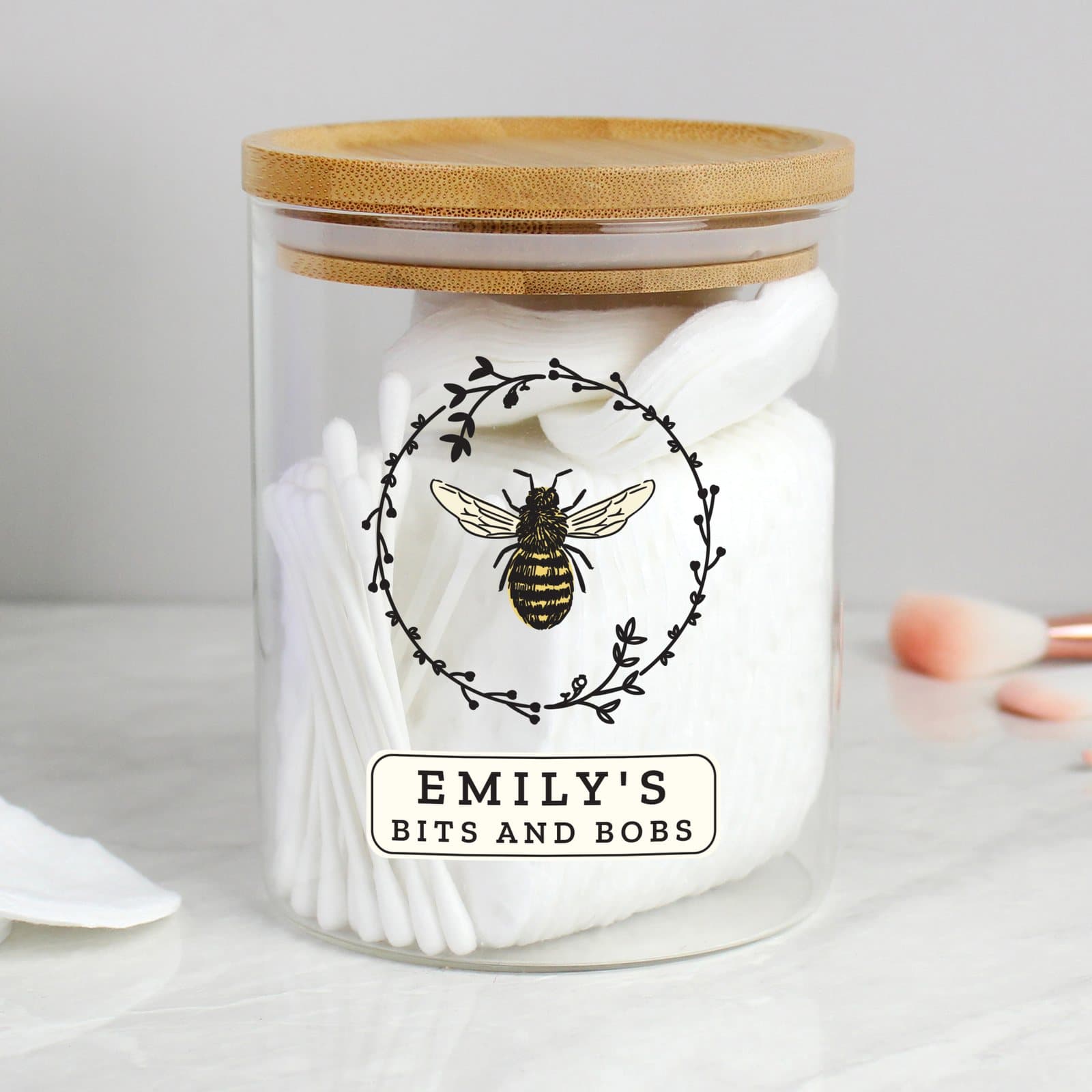 Personalised bee glass jar with a bamboo lid