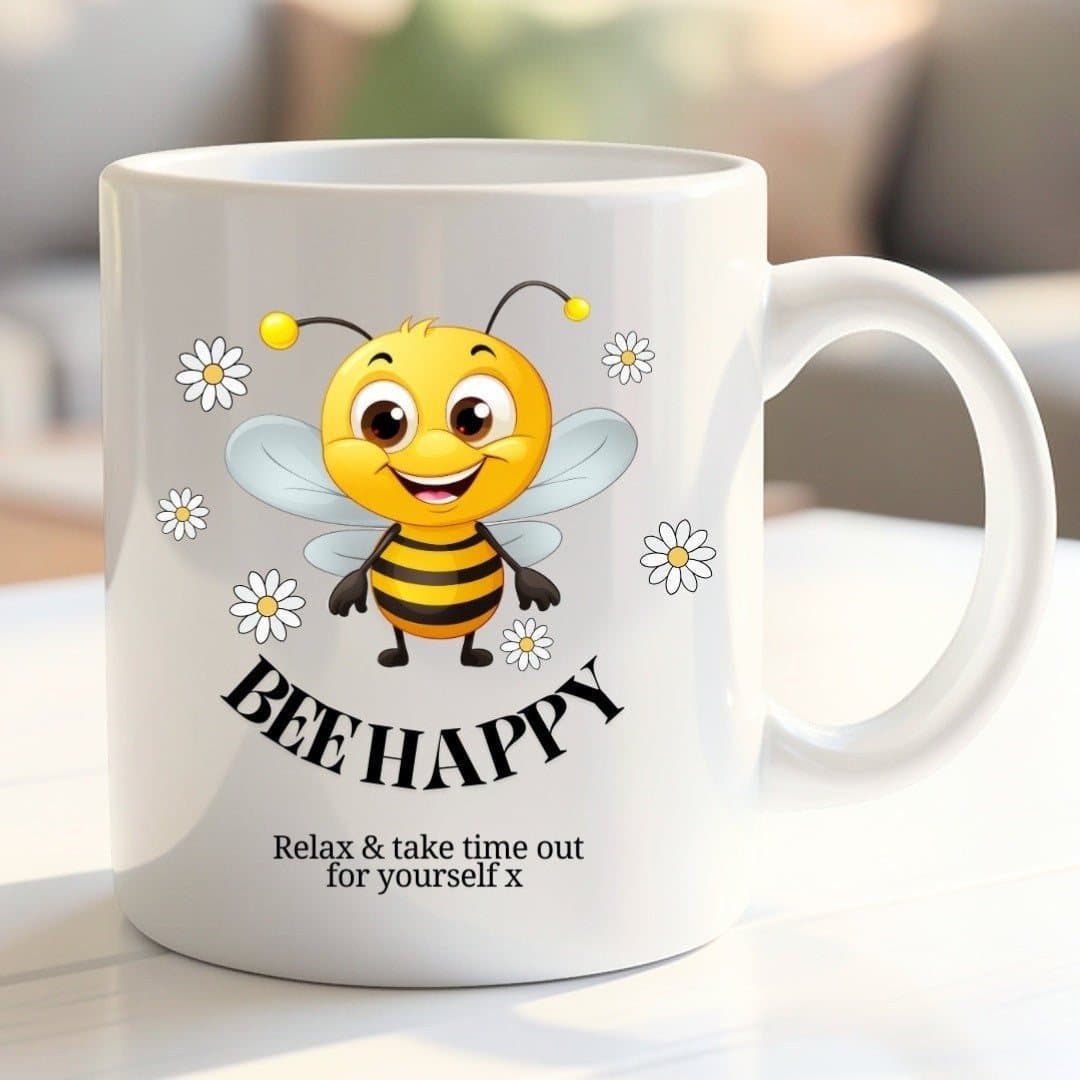 Ceramic mug with the Bee Happy design printed on it