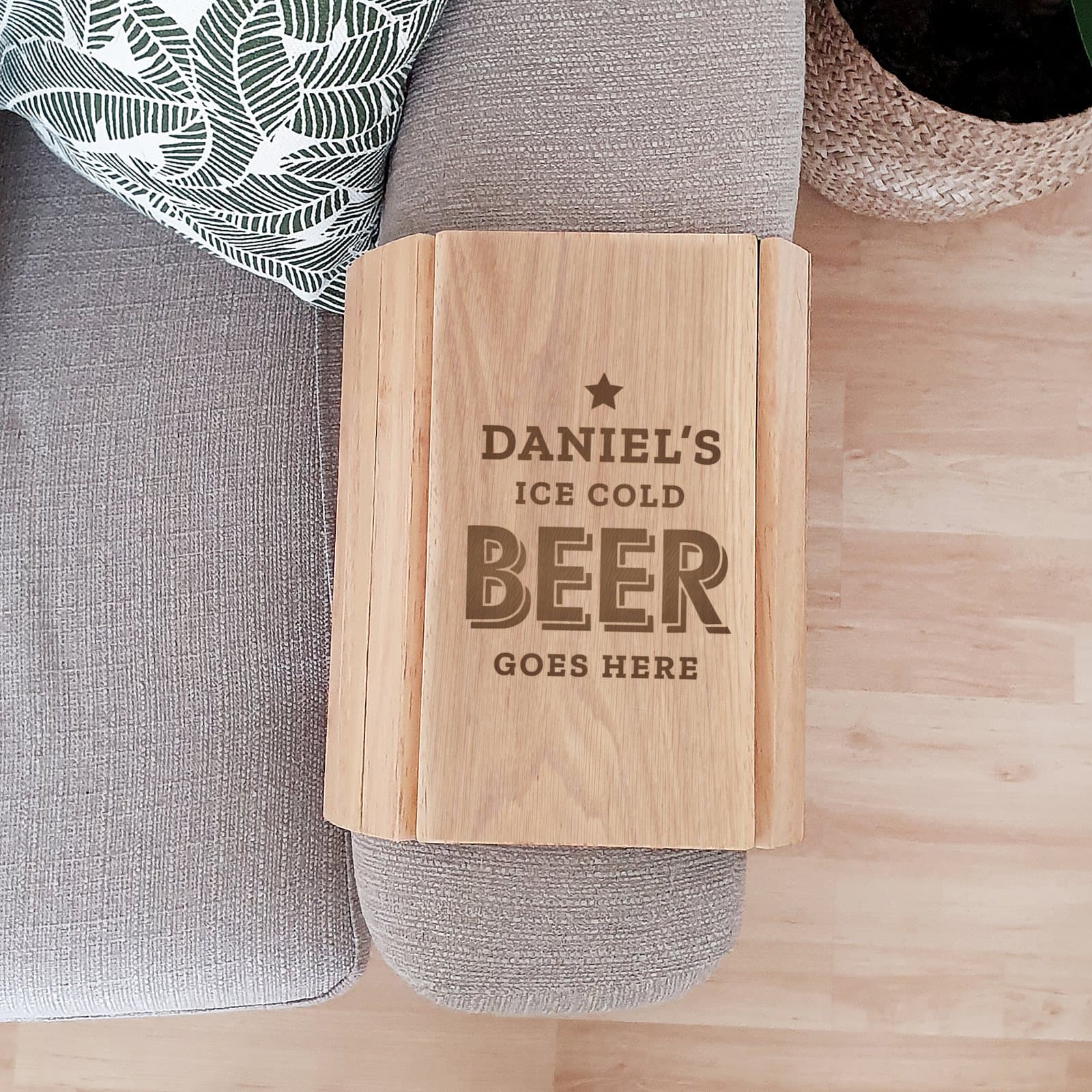 Wooden sofa tray with Ice Cold Beer Goes Here text and a personalised name