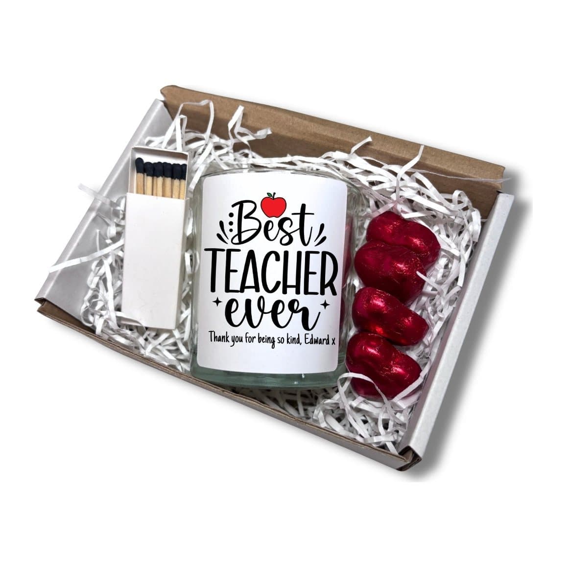 Personalised candle that reads The Best Teacher Ever, with a red apple design