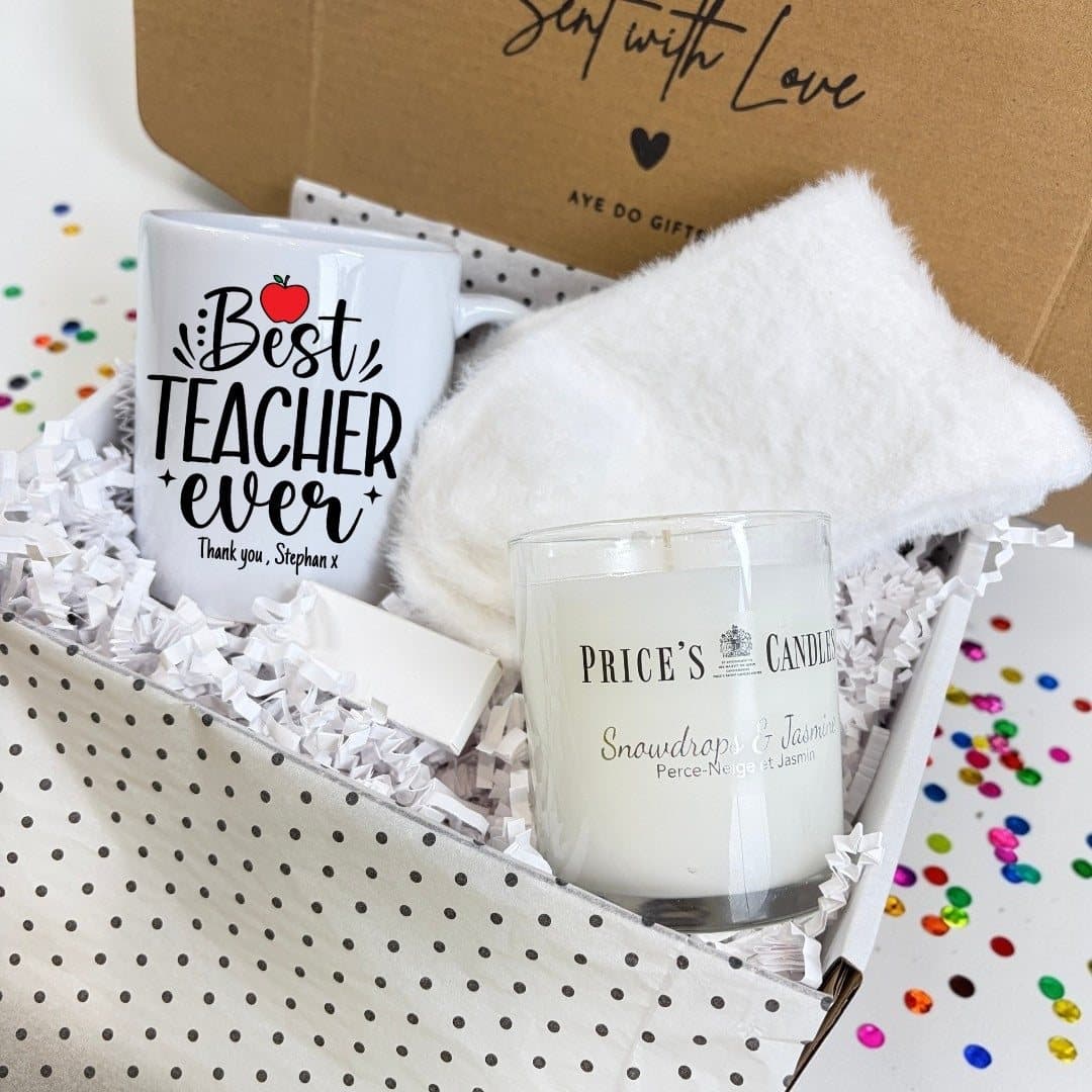 Best Teacher Ever mug, scented candle, fluffy socks and matches in a gift hamper