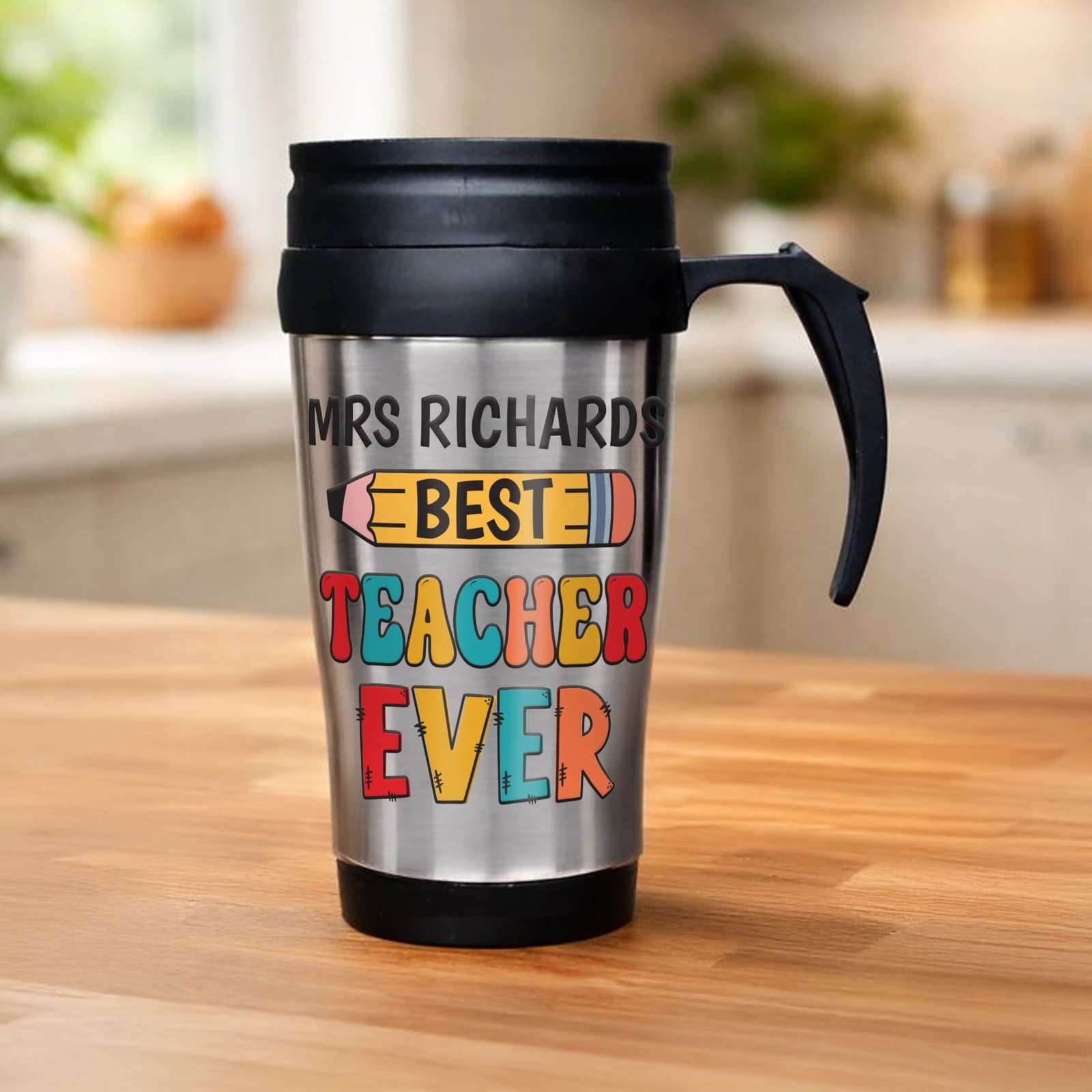 Stainless steel thermal mug personalised with a name and BEST TEACHER EVER text