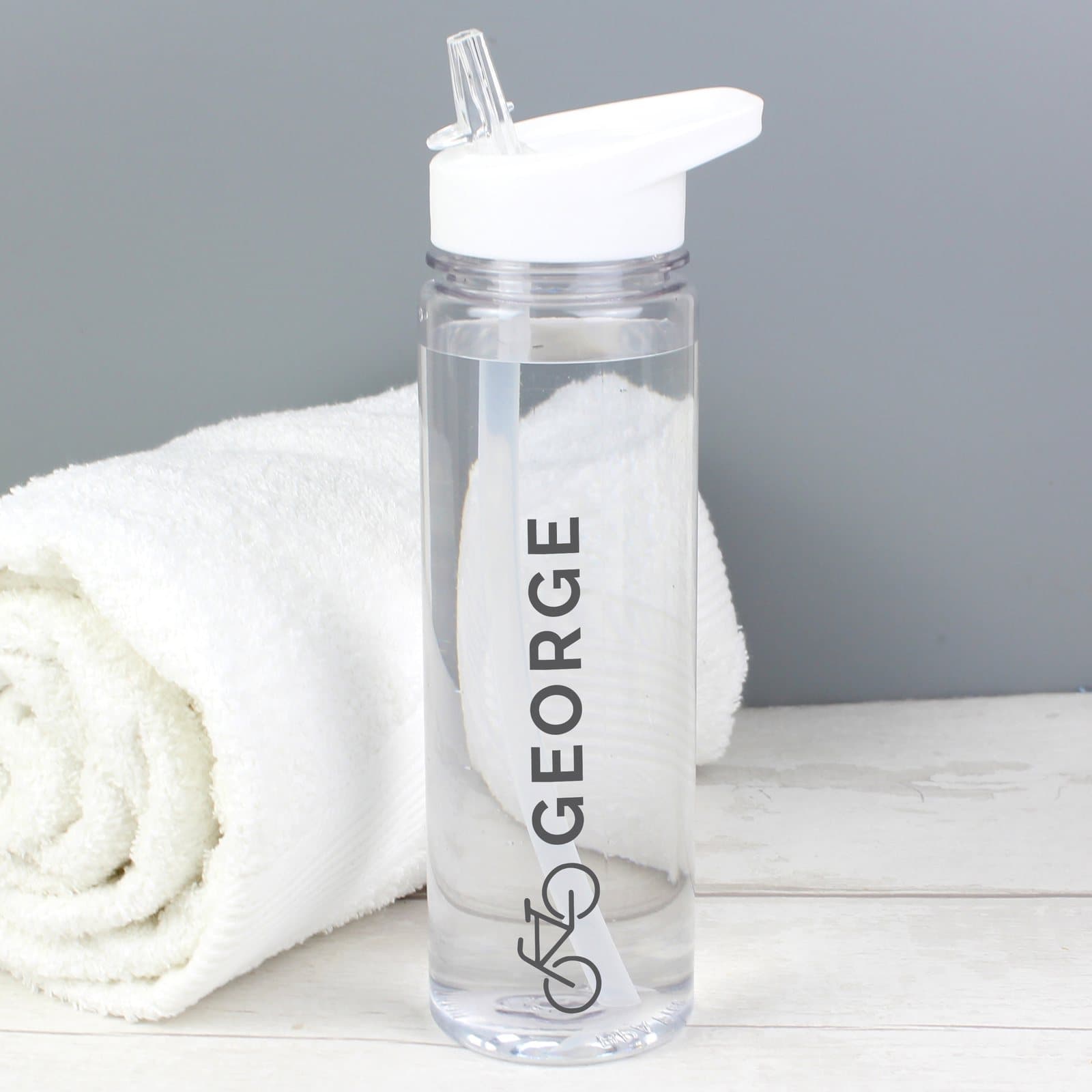 Personalised bicycle water bottle with white lid and straw