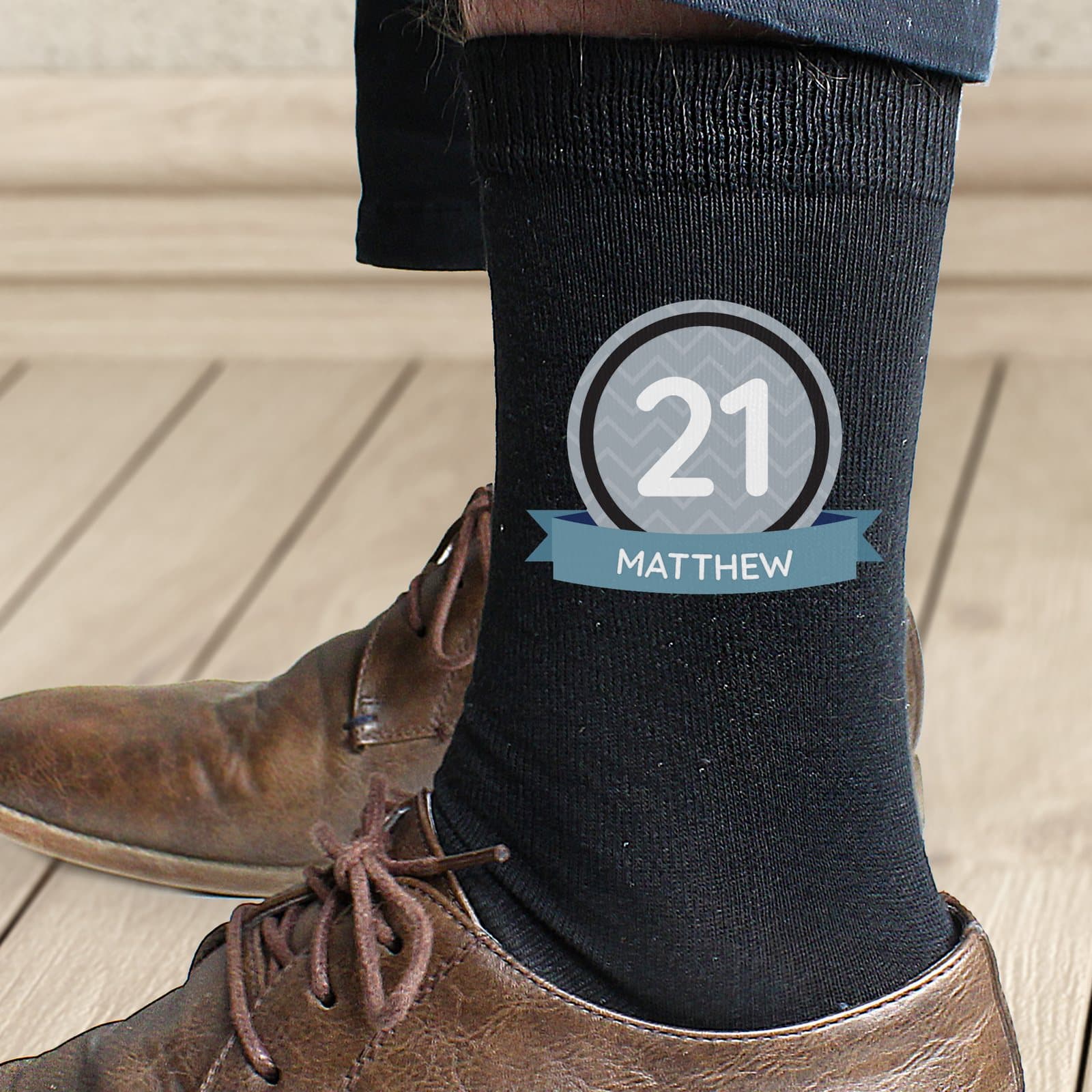 Personalised birthday men's socks showing an age and name
