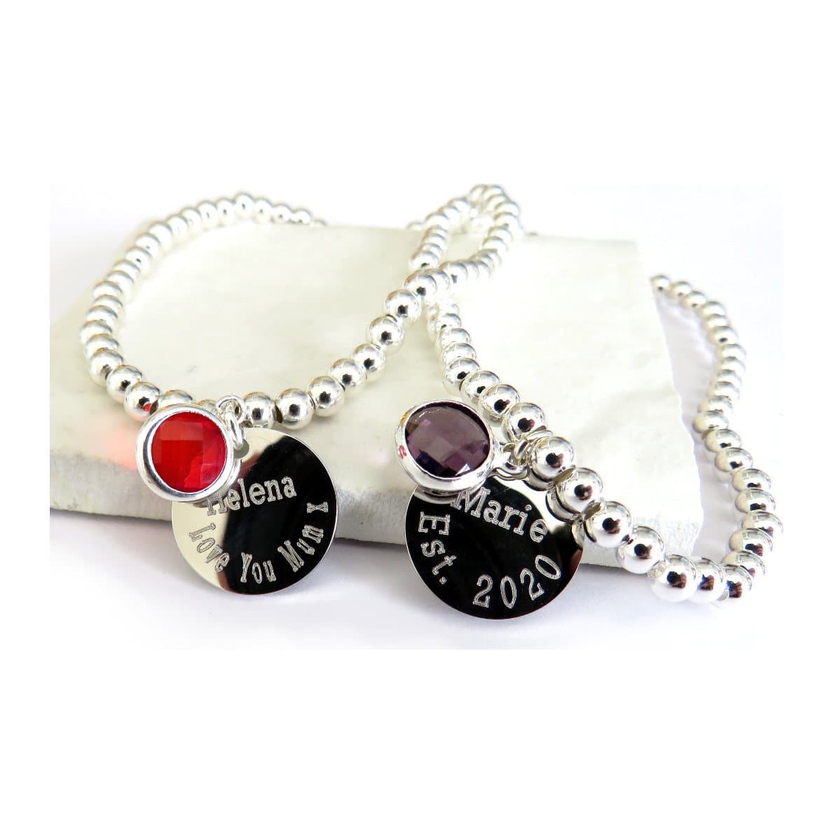 Personalised birthstone beaded bracelet with a silver coloured engraved charm