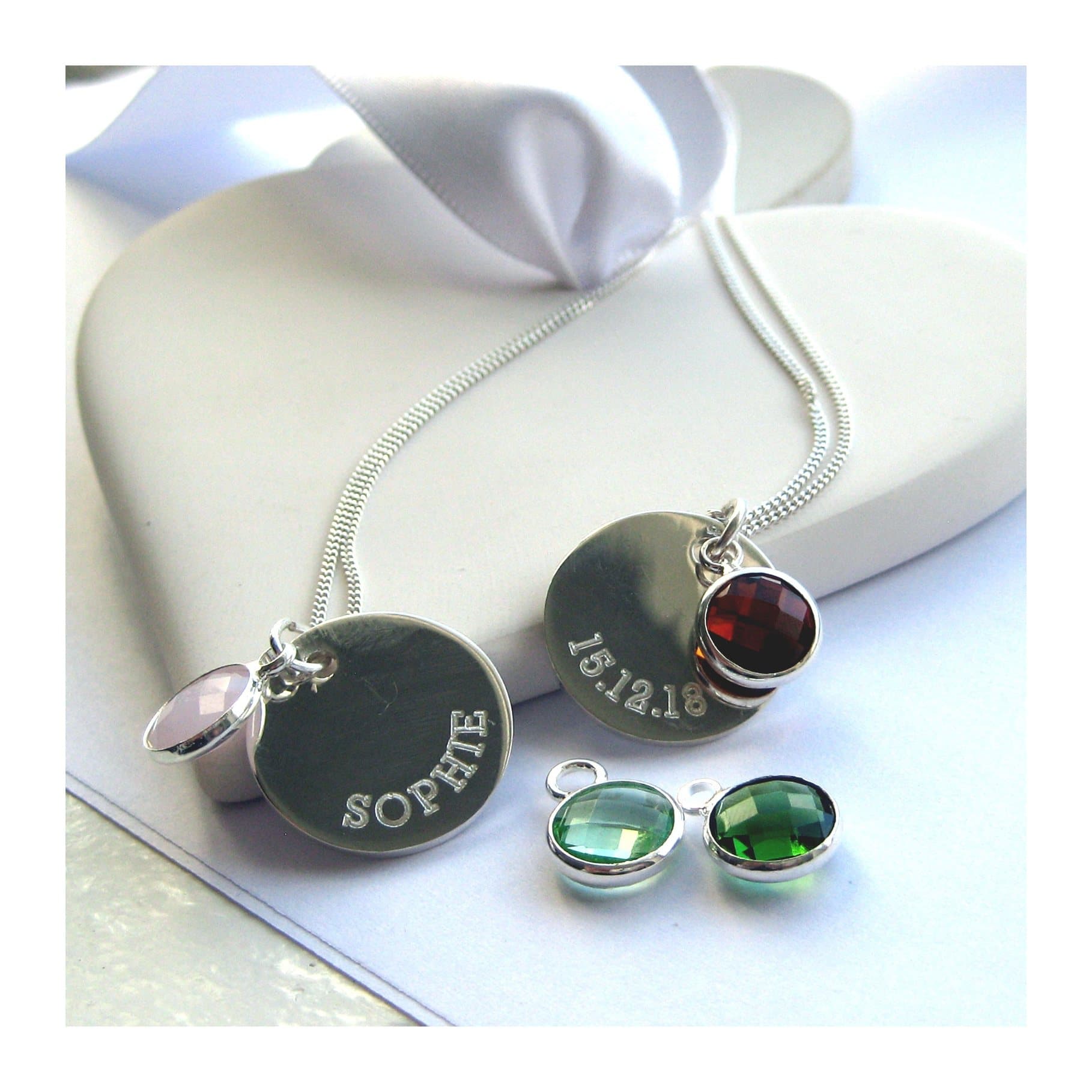Birthstone charm necklace with a round stainless steel disc and a coloured birthstone