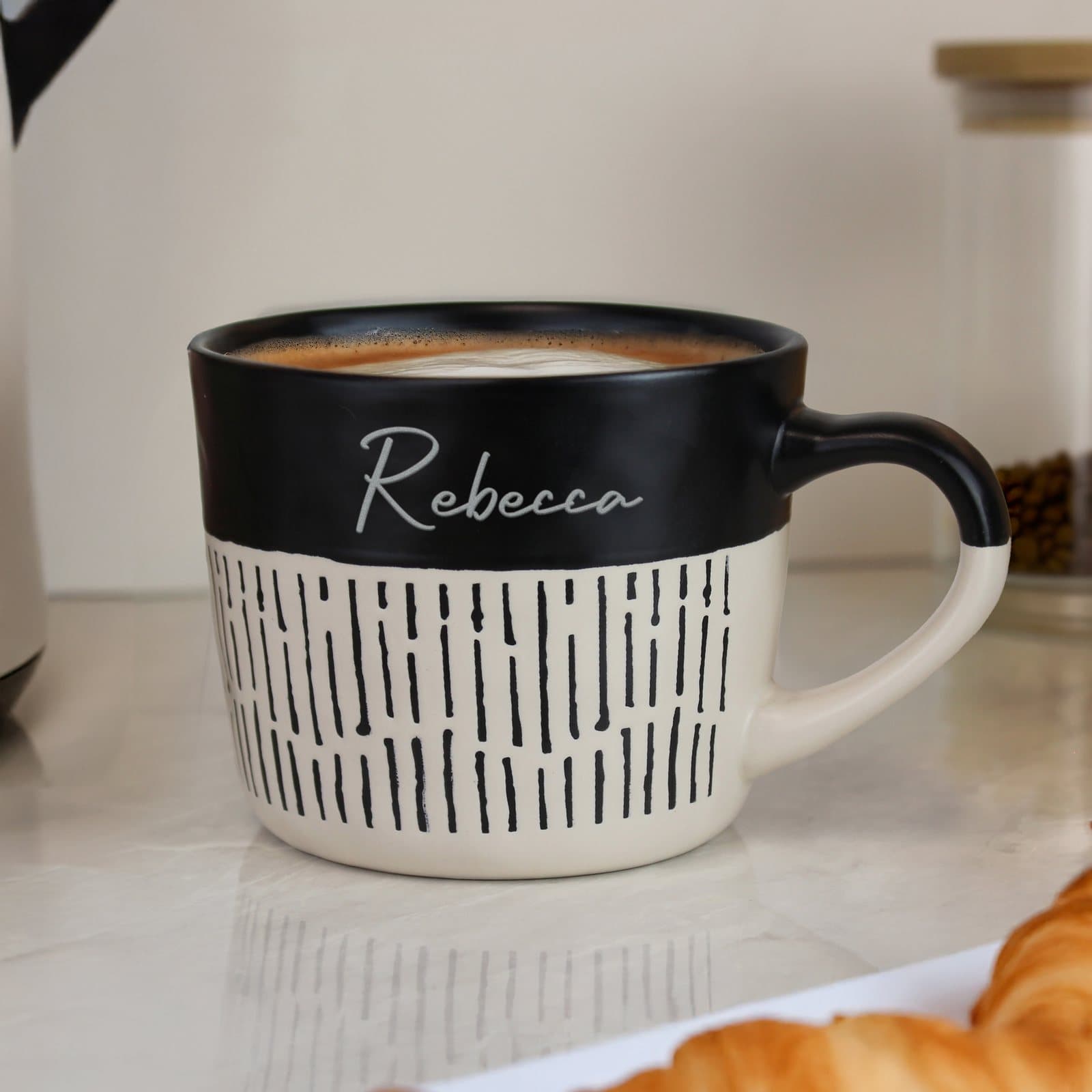 Ceramic mug dipped in black with a personalised name