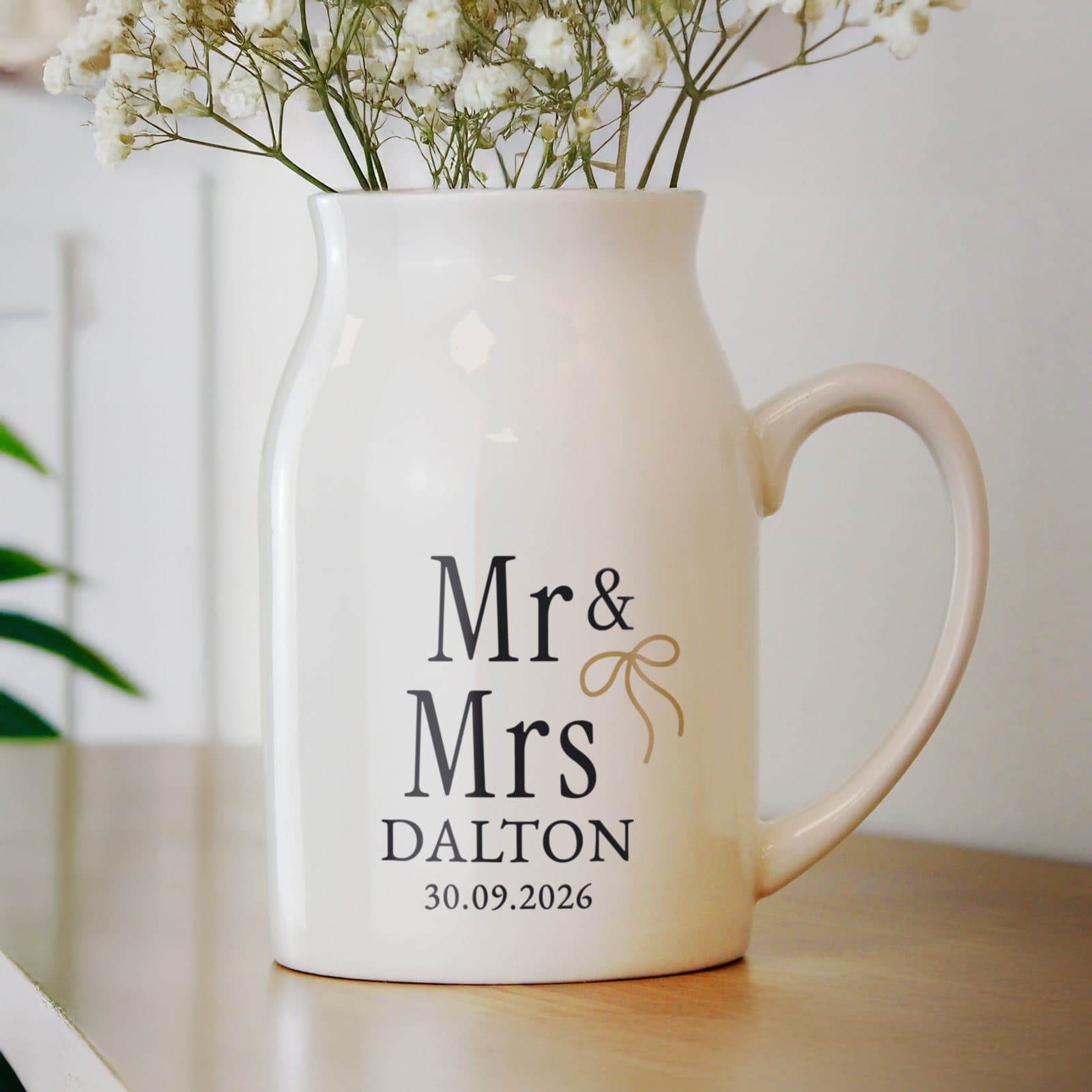 Black and gold ceramic jug vase with personalised text lines