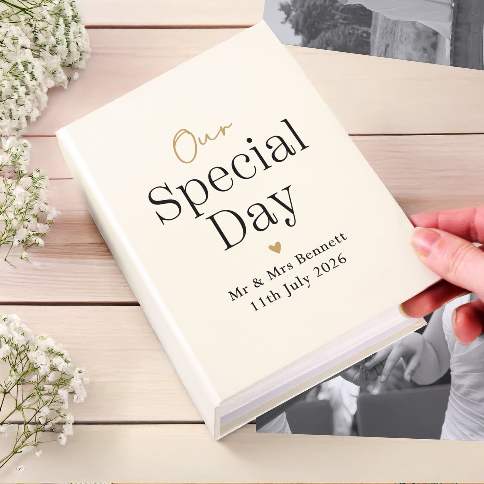Black and gold 6x4 photo album with a personalised message on the cover