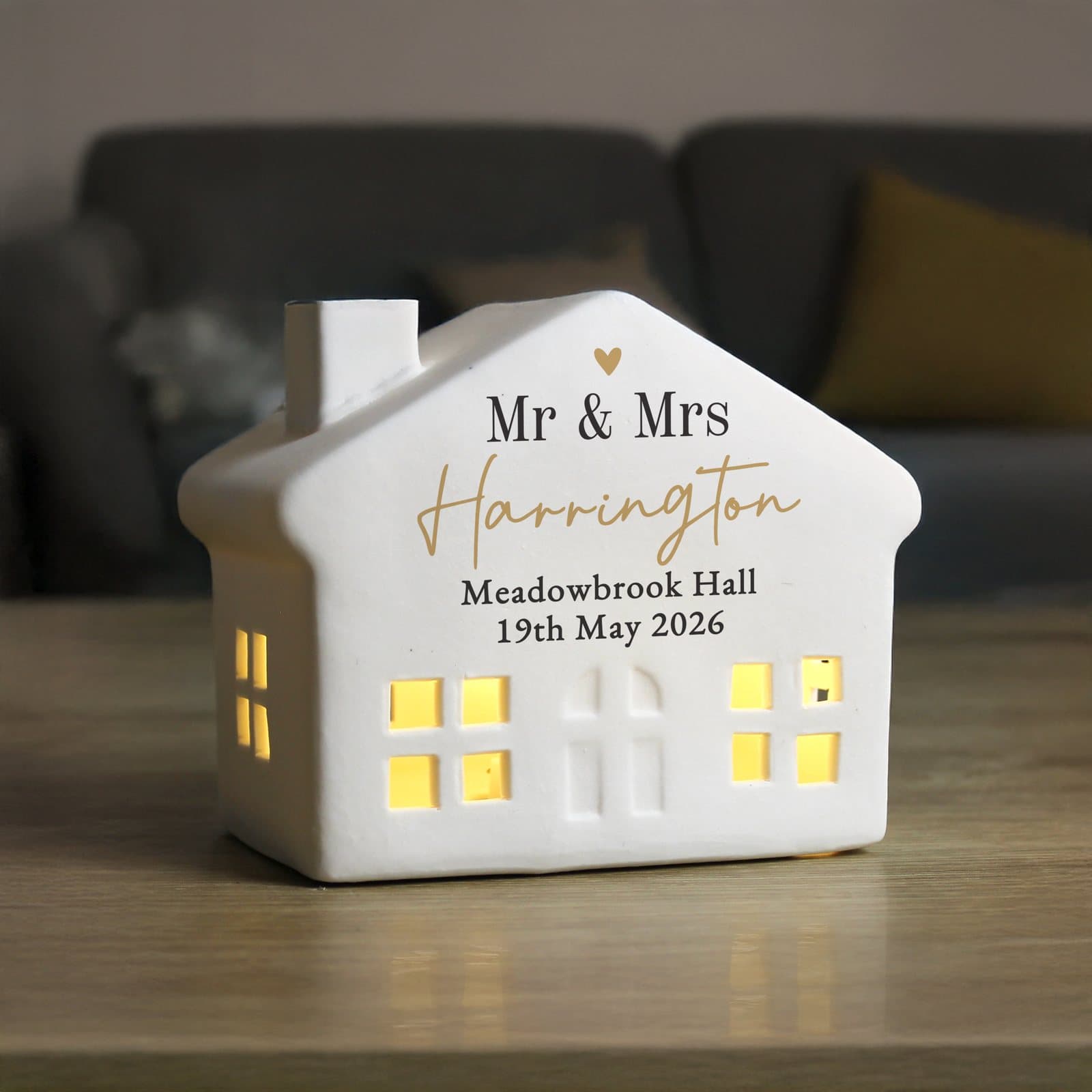 Personalised black and gold ceramic LED house with cut-out windows