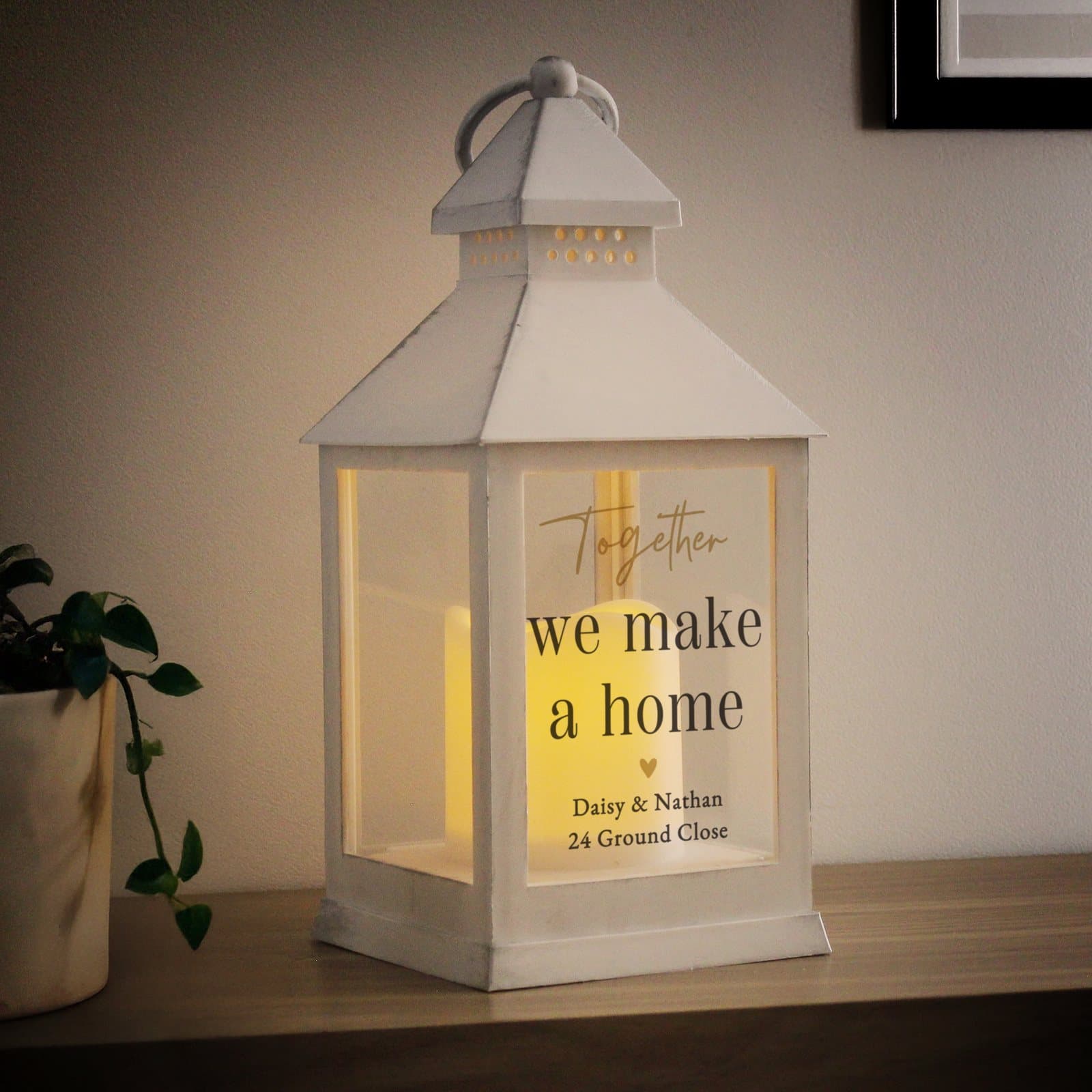 Personalised white lantern with black and gold design and lines of text