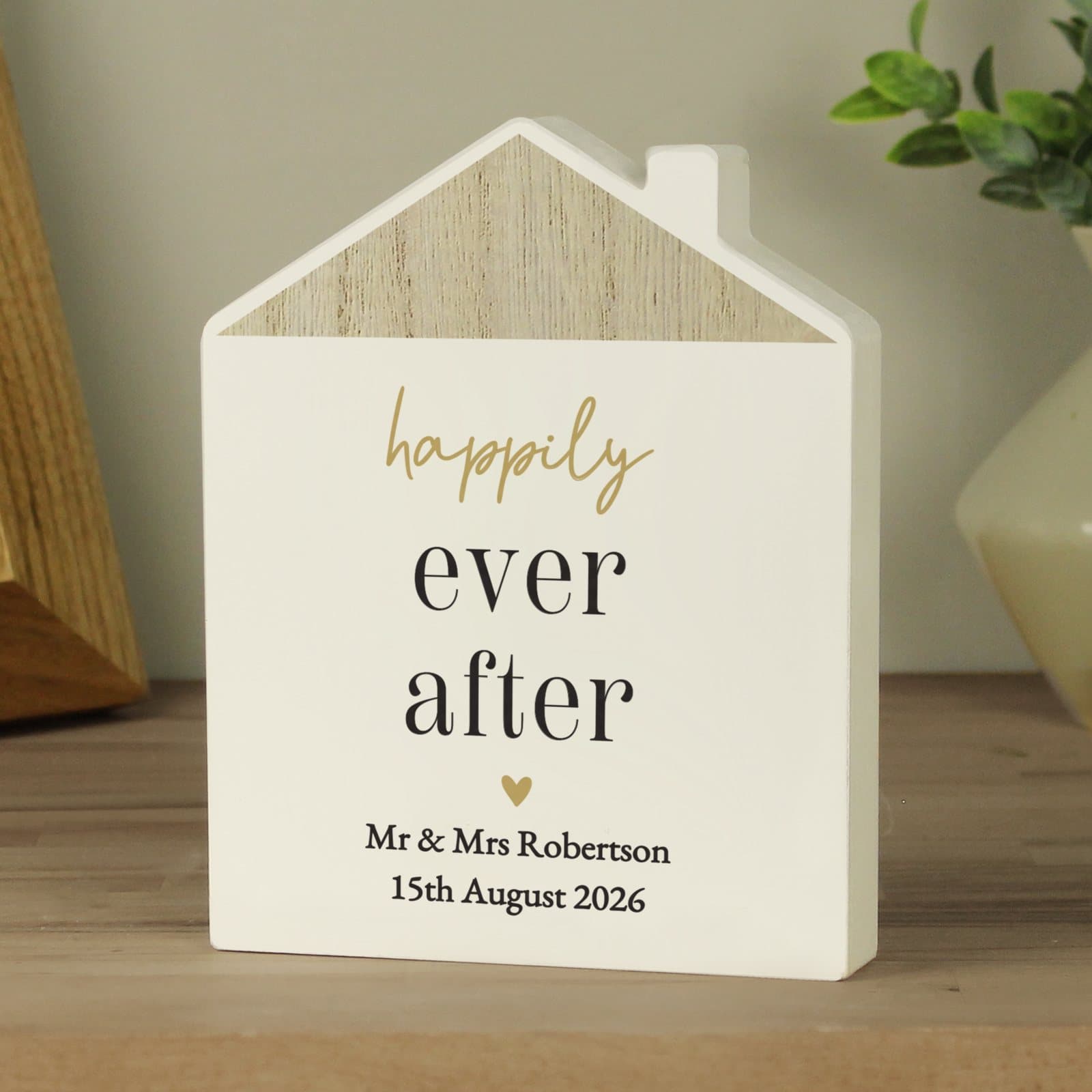 Wooden house ornament in neutral grey with personalised lines of text