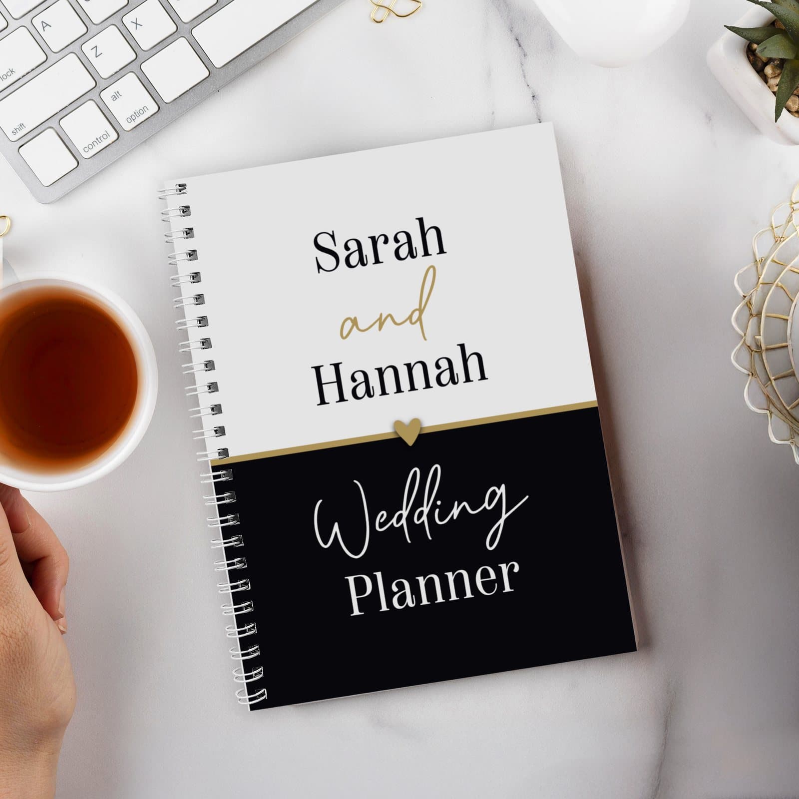 Black and gold A5 wedding planner with a personalised cover