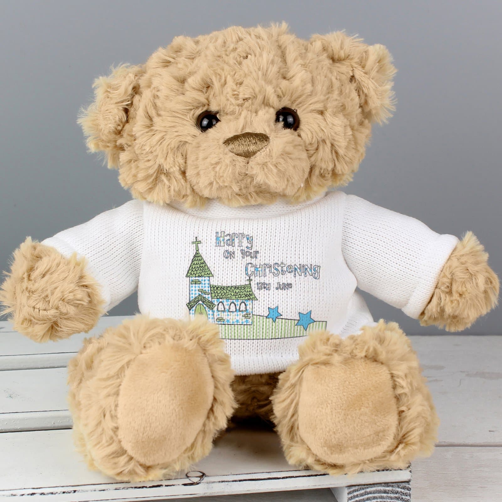 Teddy bear in a T-shirt with a church design