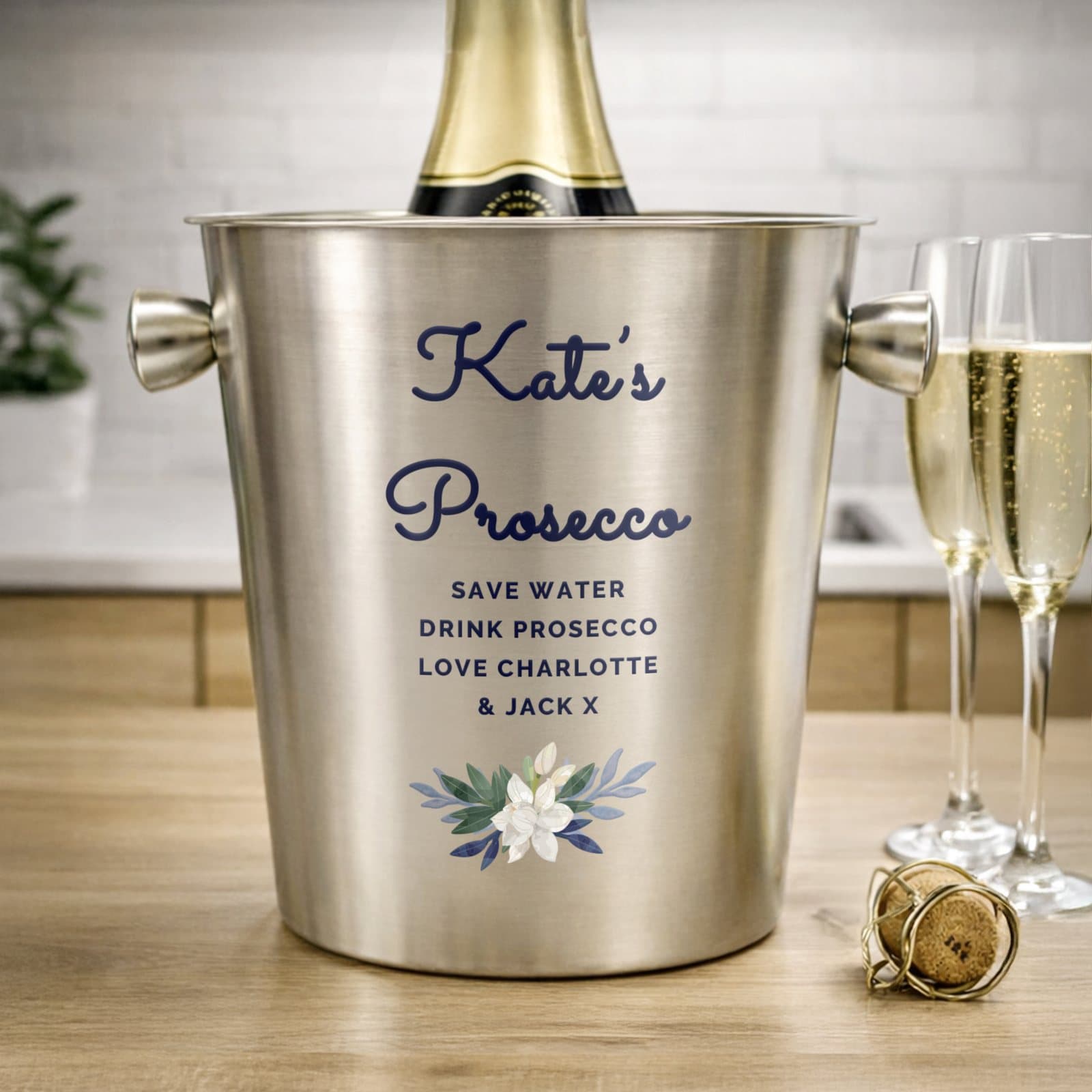 Brushed stainless steel ice bucket with blue floral design
