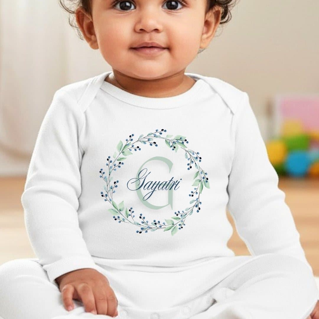 Blue and green floral personalised baby grow with a name printed on it