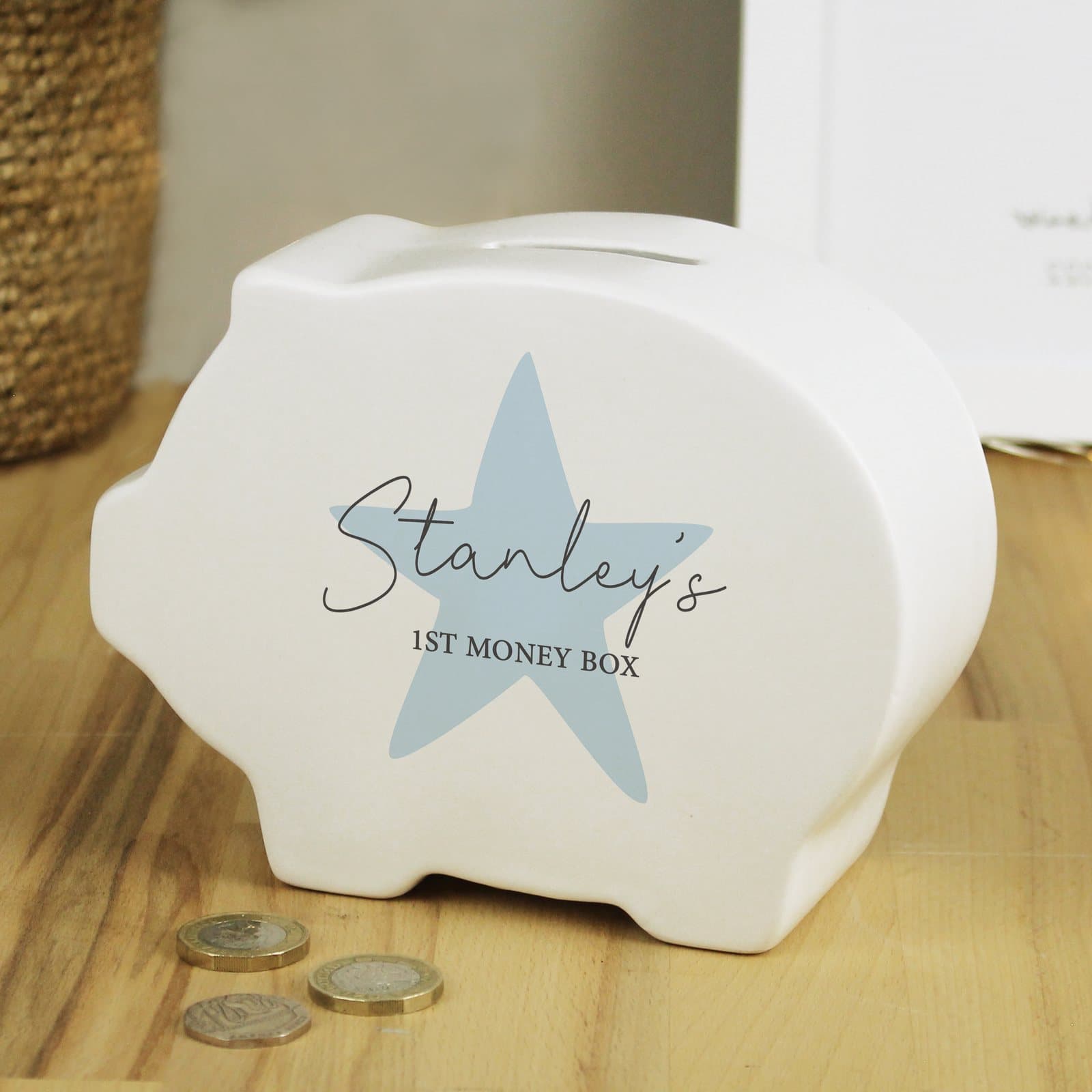 Blue star ceramic piggy bank with a name and message