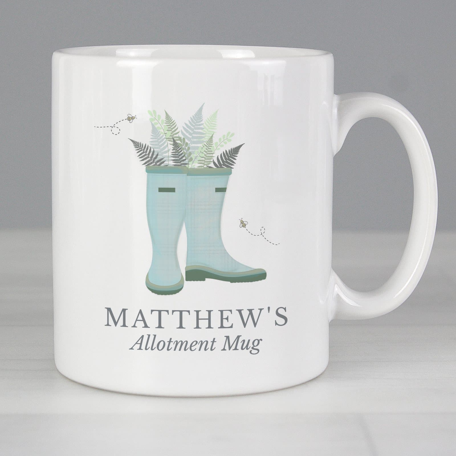 Ceramic mug with a blue wellies design