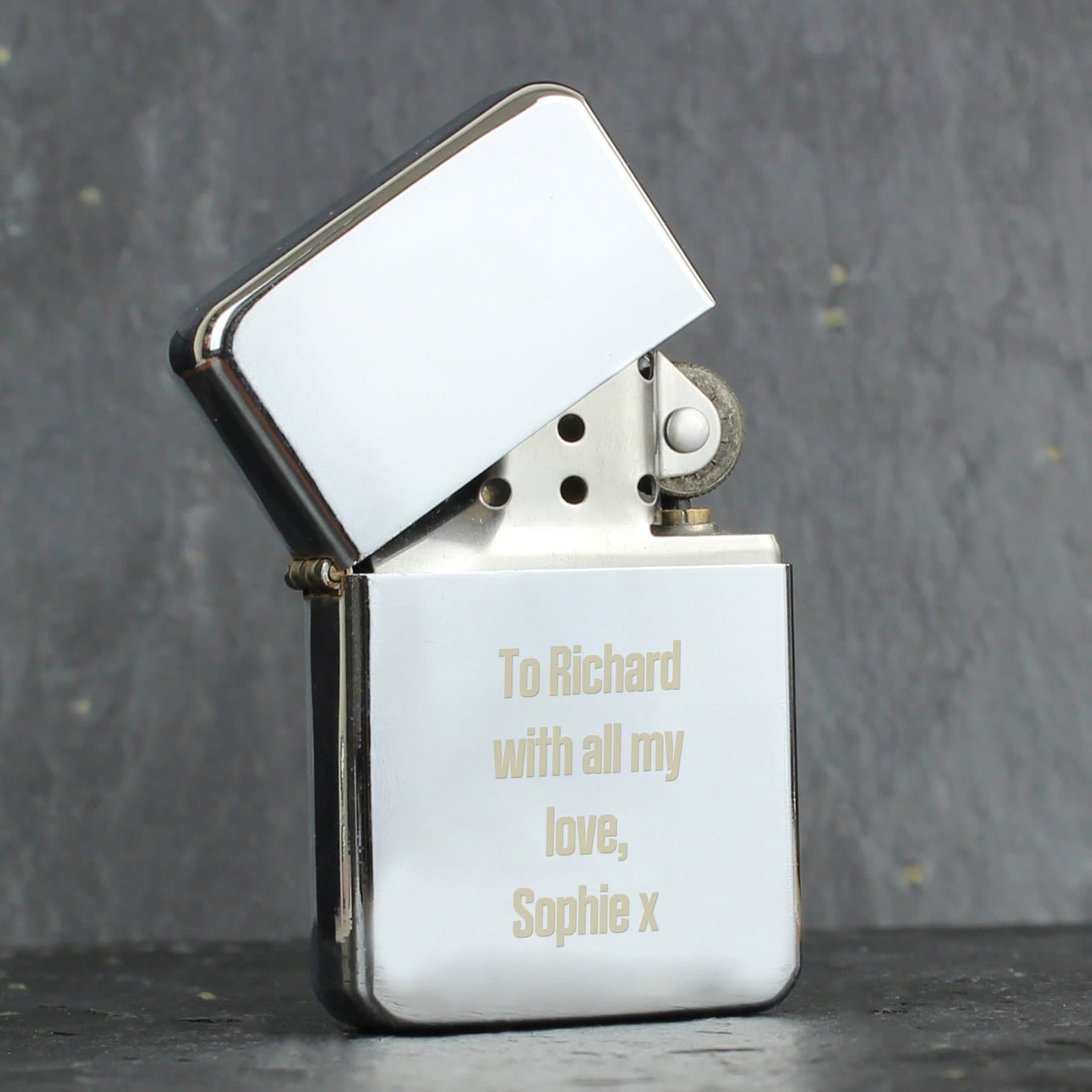 Chrome oil lighter personalised with a four-line message