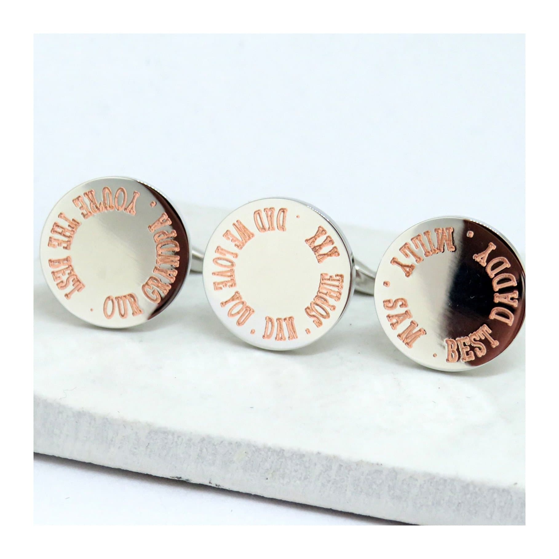 Round silver coloured personalised wedding cufflinks with an engraved name