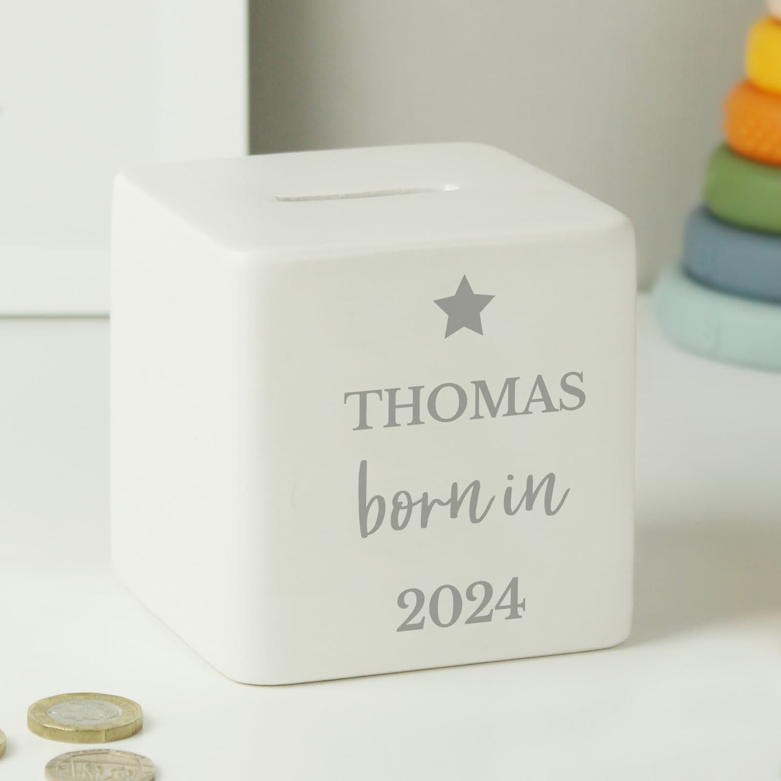 Square ceramic money box personalised with a name and date on the front