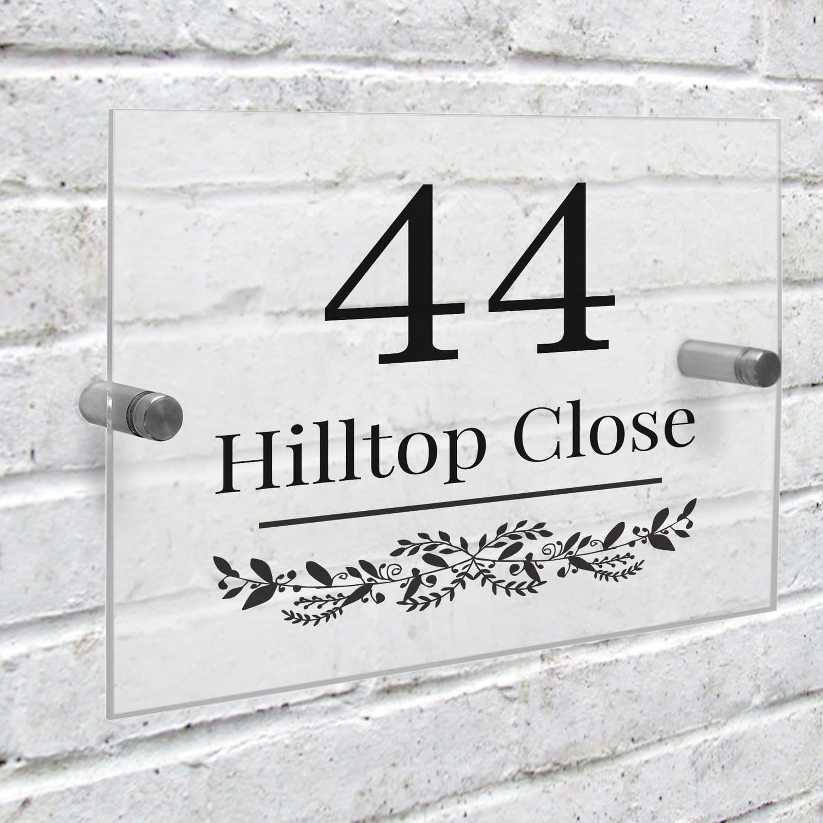 Acrylic house sign with a leafy botanical effect and house number