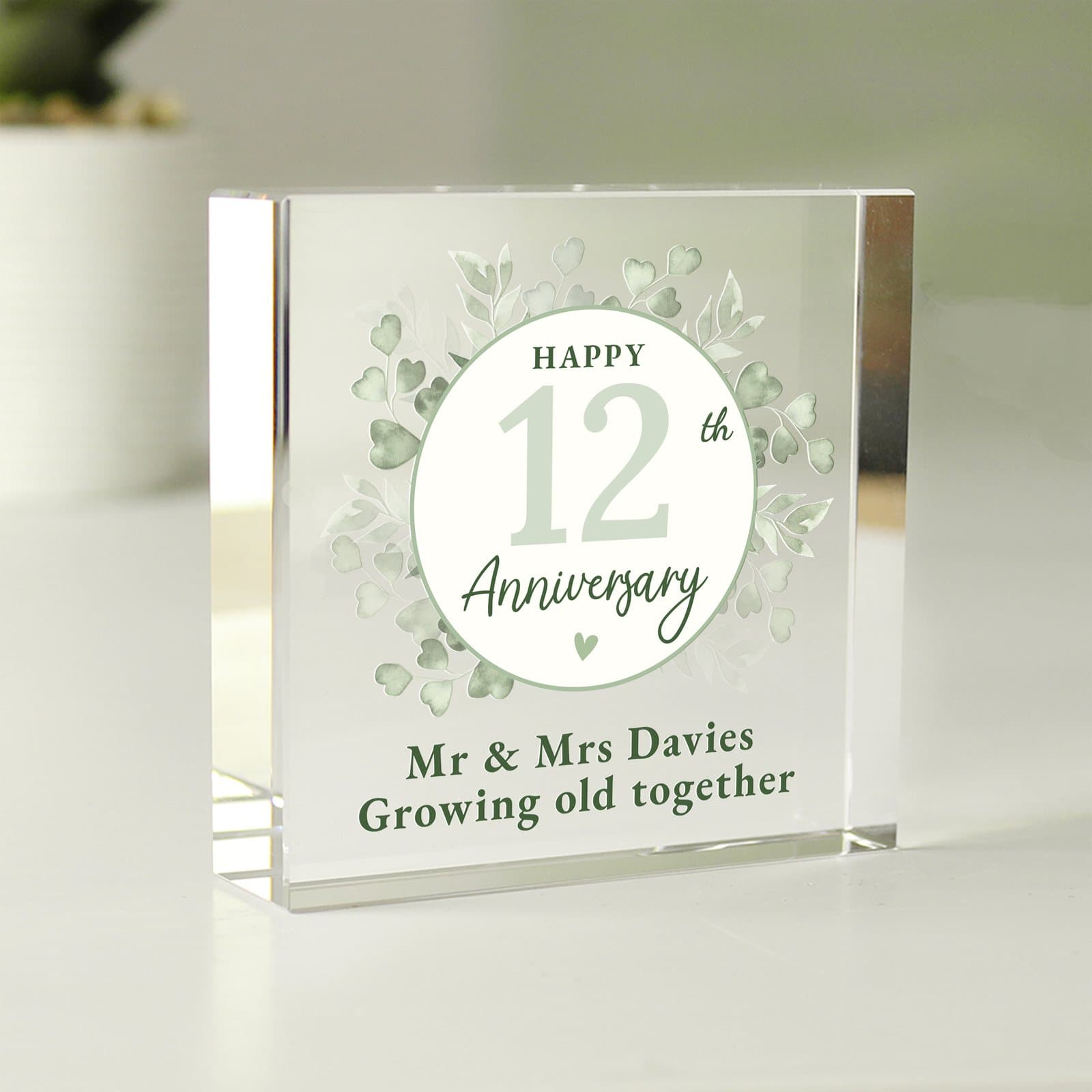 Square crystal anniversary token with a number and a message