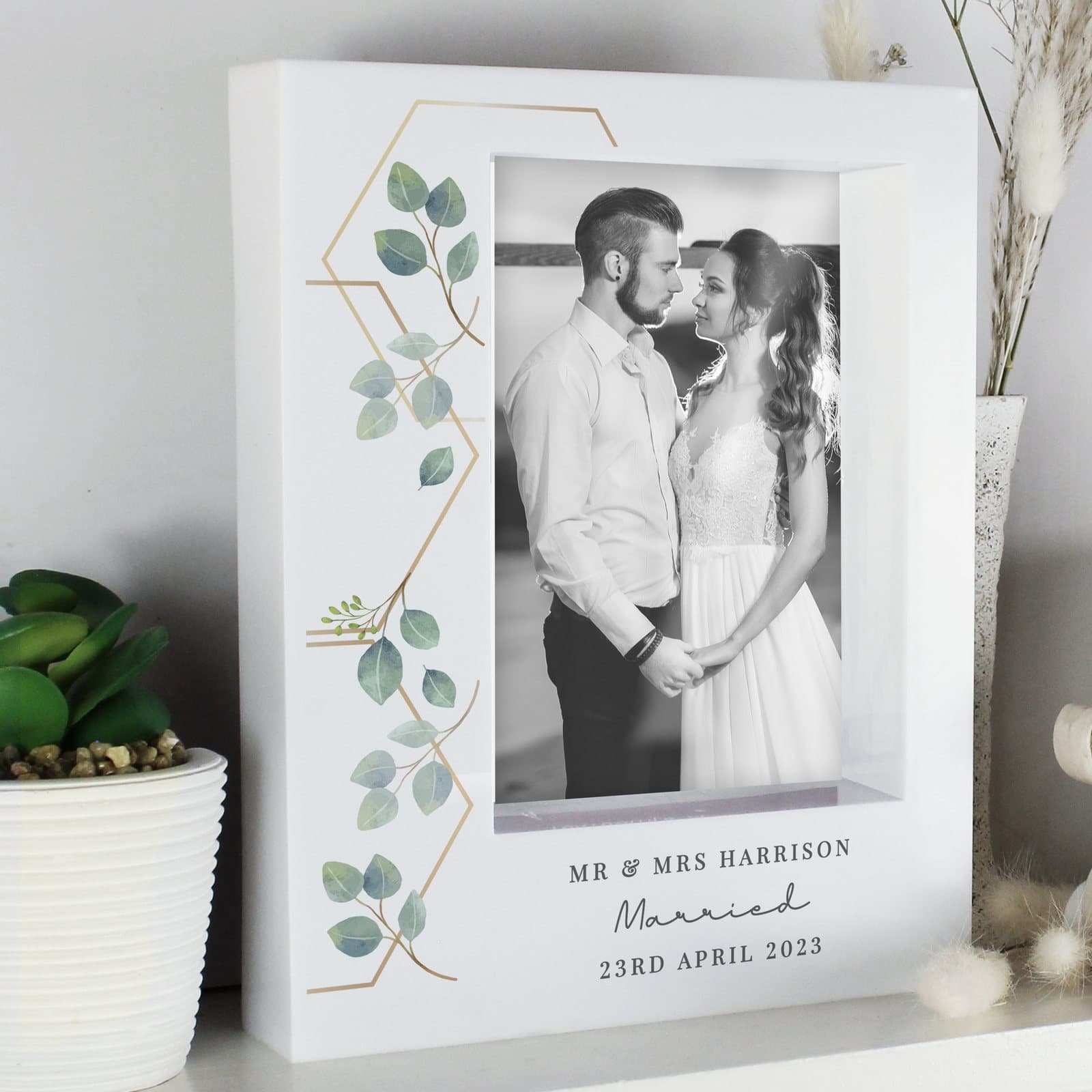 White botanical box photo frame with three lines of personalised text
