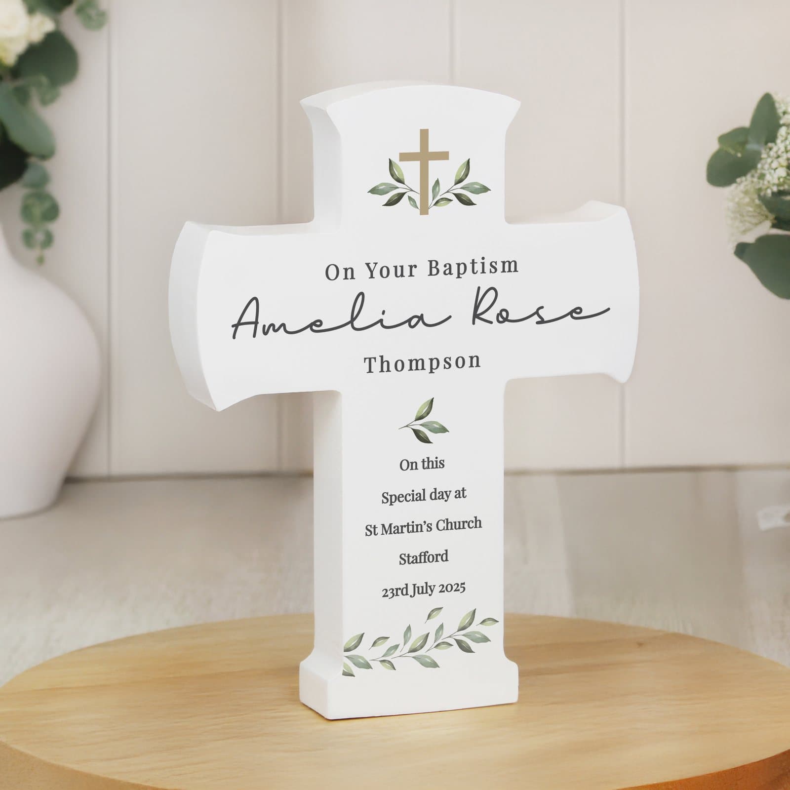 Wooden cross ornament with intricate design, personalised with eight lines of text