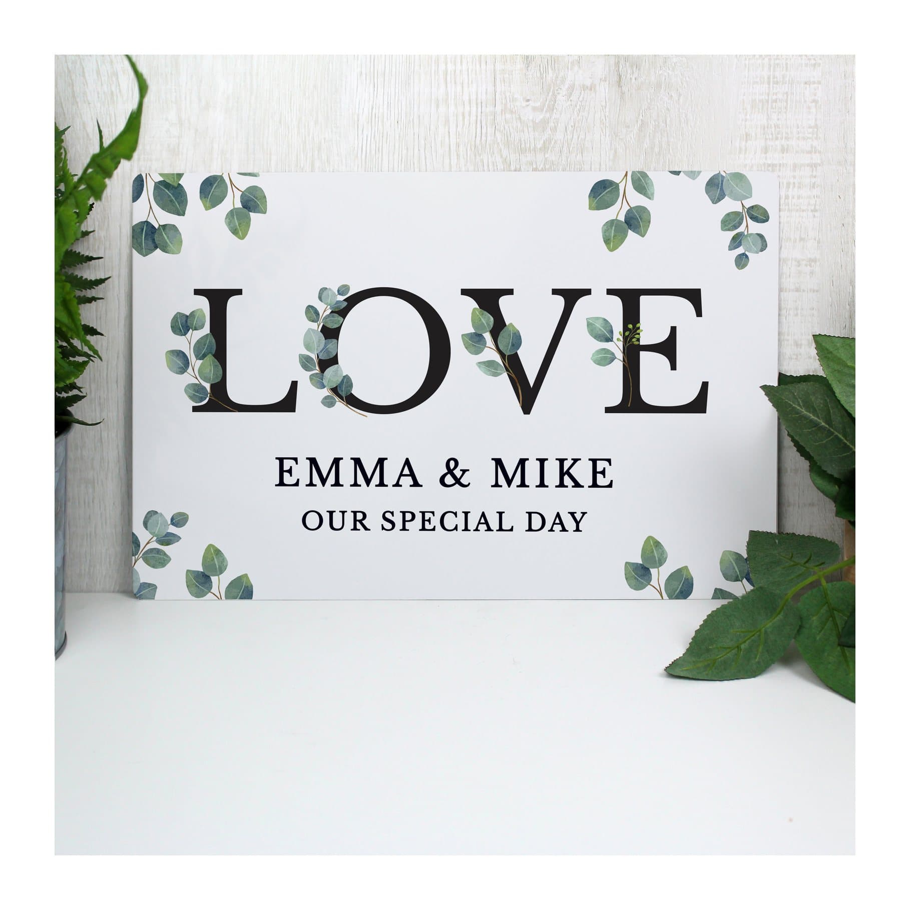 Botanical metal sign with the word LOVE and two lines of personalised text