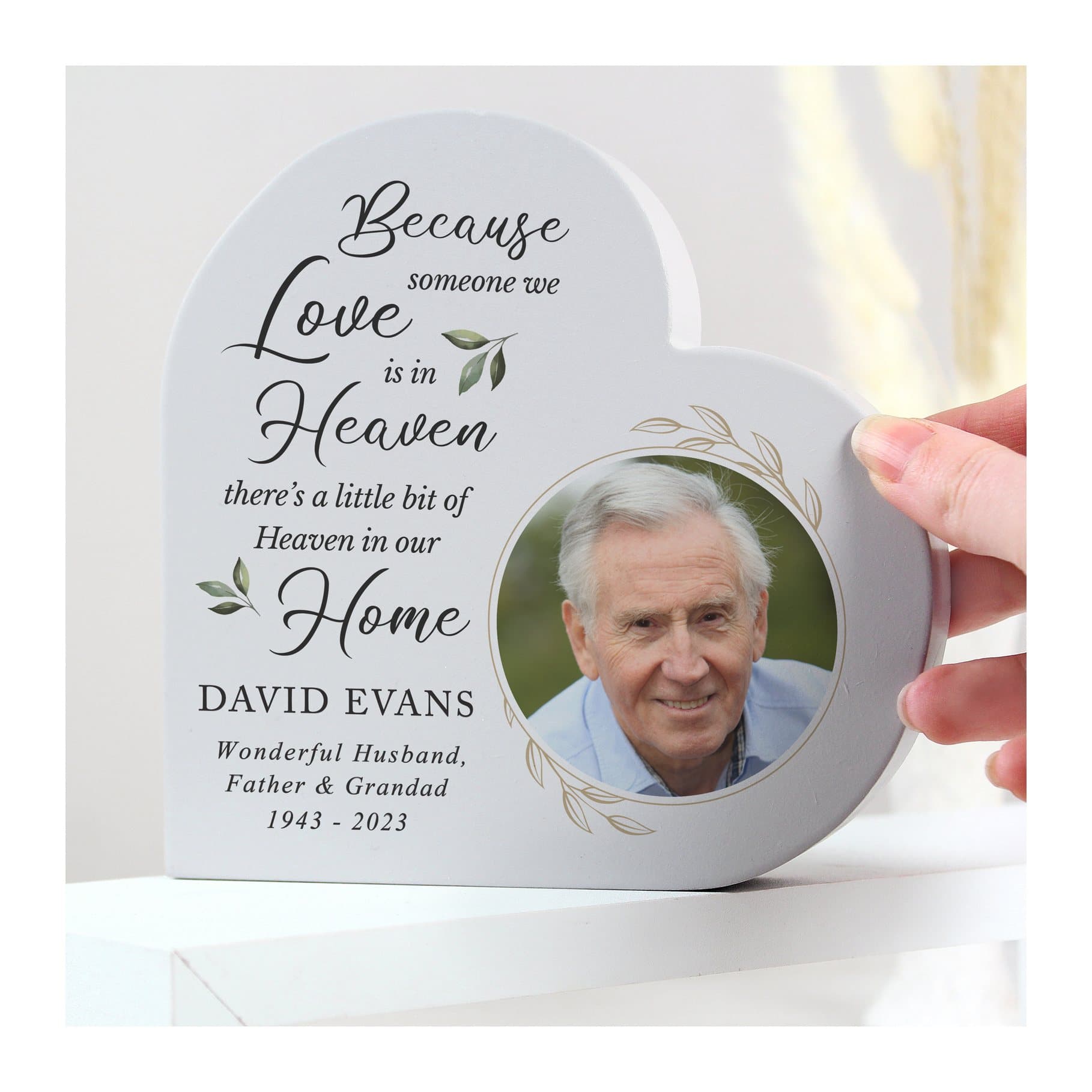 Free standing wooden heart ornament with a photo and lines of memorial text