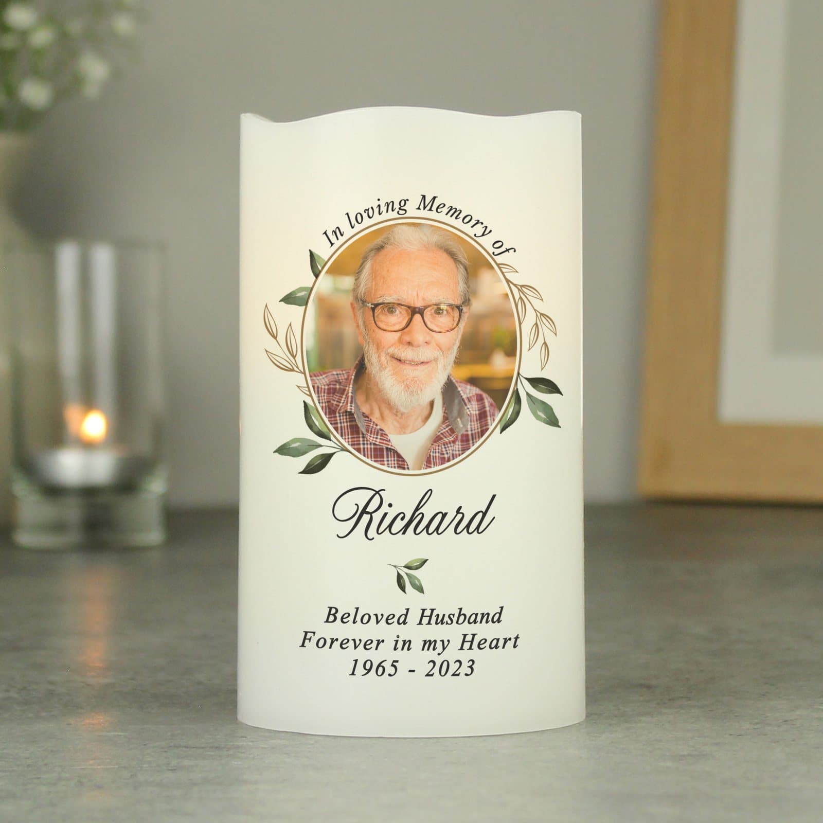 LED memorial candle with a photo and script text, presented with an organza bag