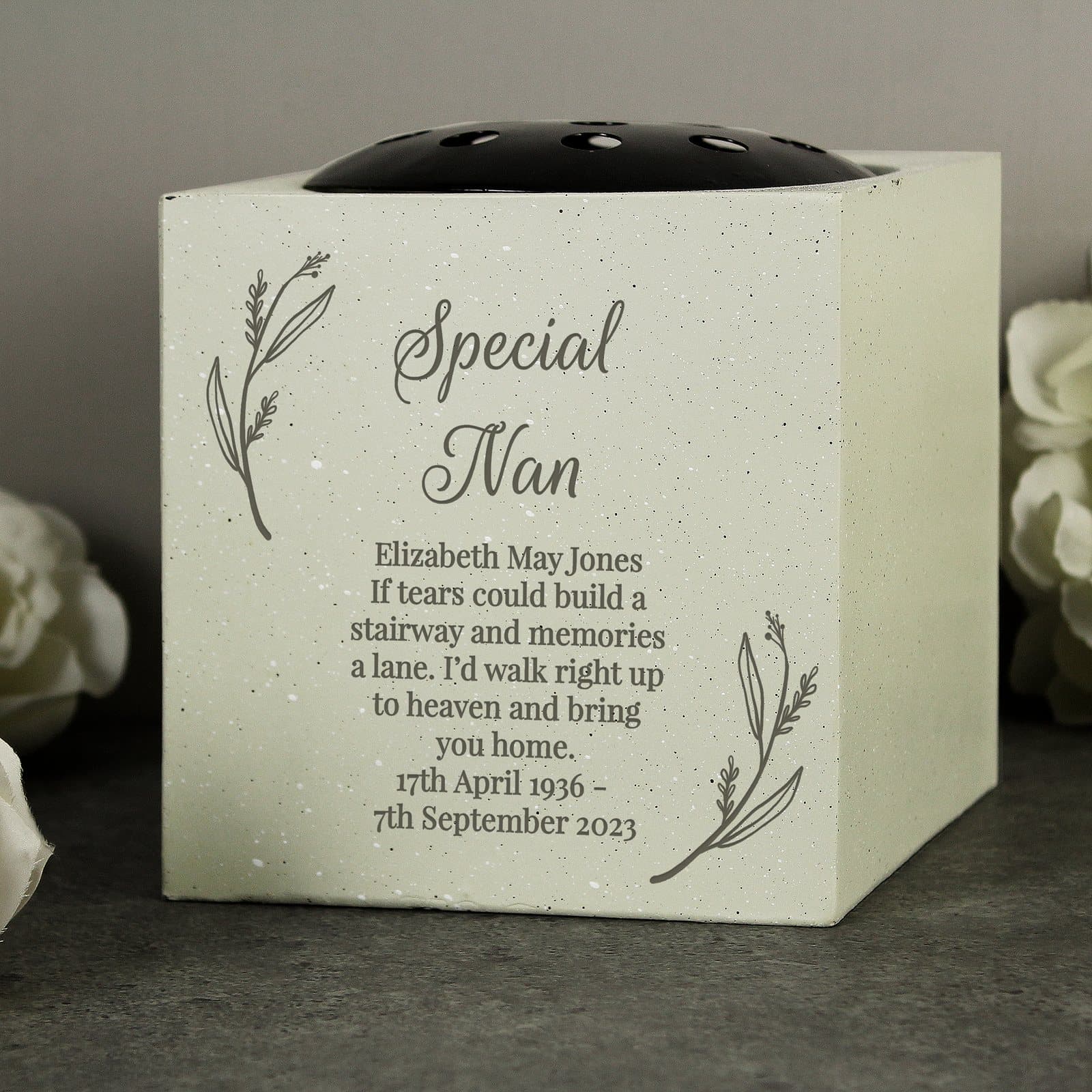 Resin botanical memorial vase personalised with lines of text on the front