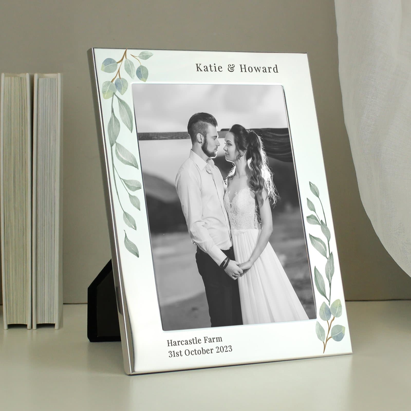 Silver aluminium botanical photo frame with text above and below the photo