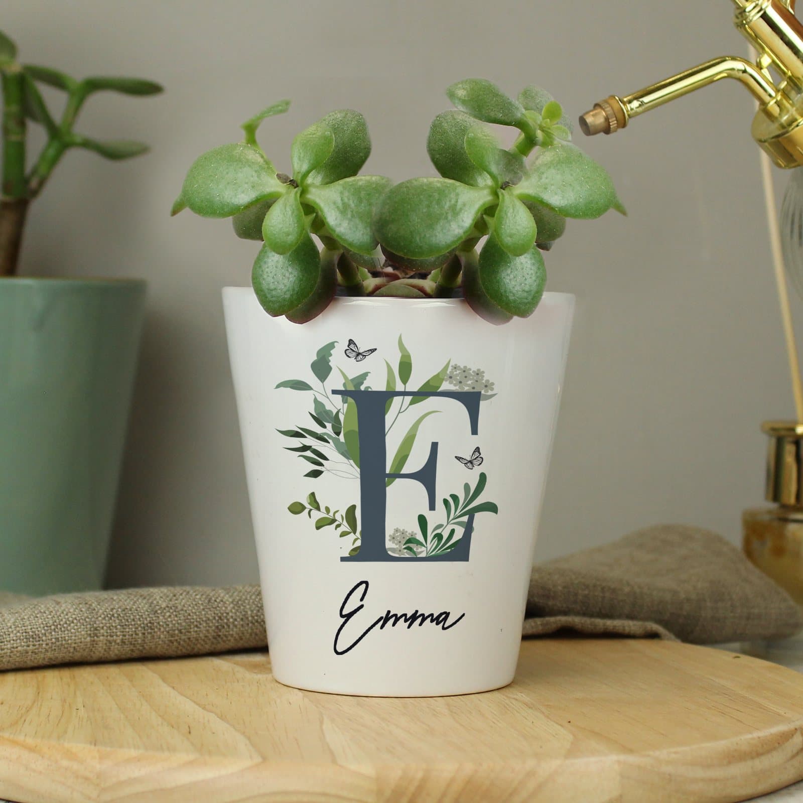 Ceramic botanical plant pot with an initial and a name