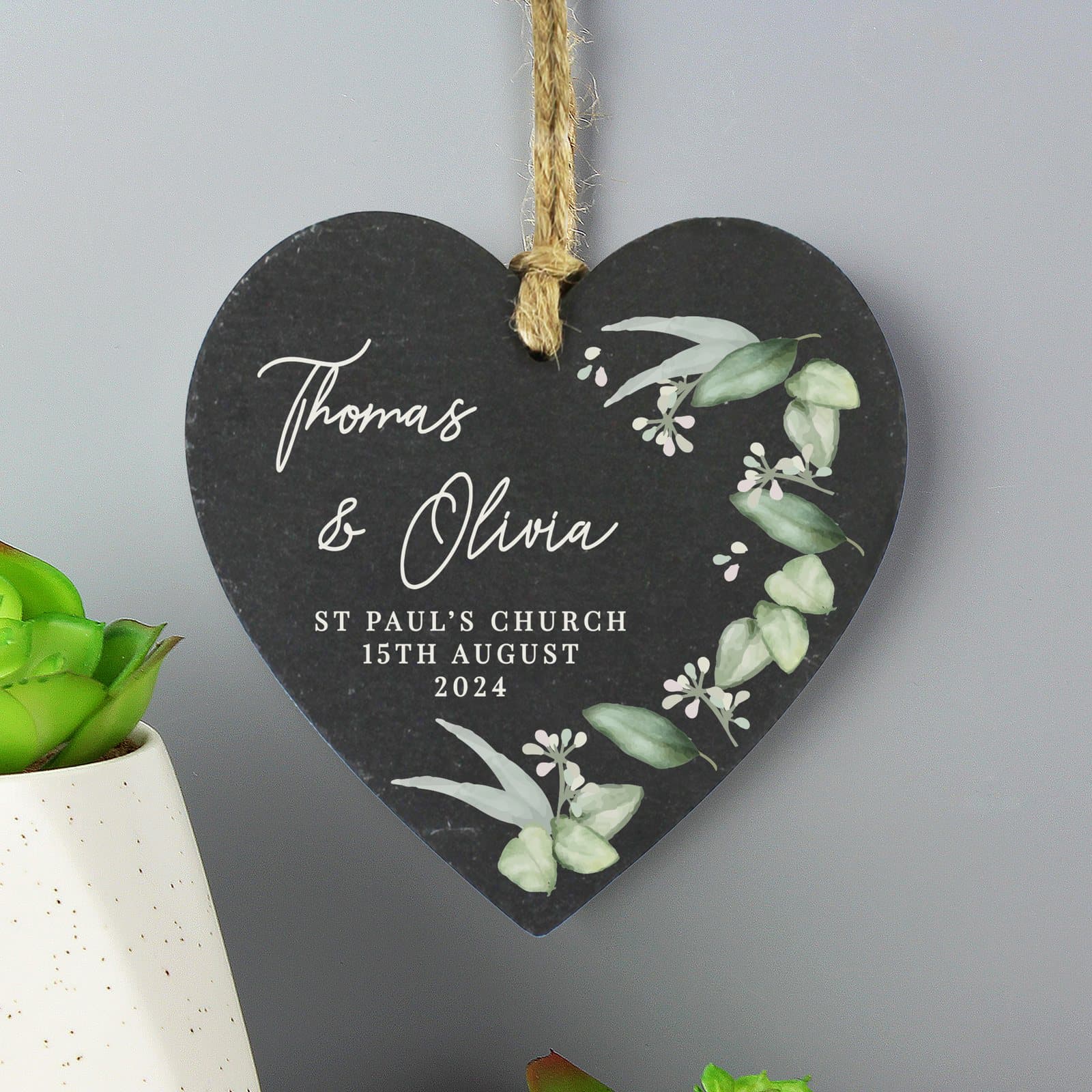 Hanging slate heart decoration with a botanical design and personalised text